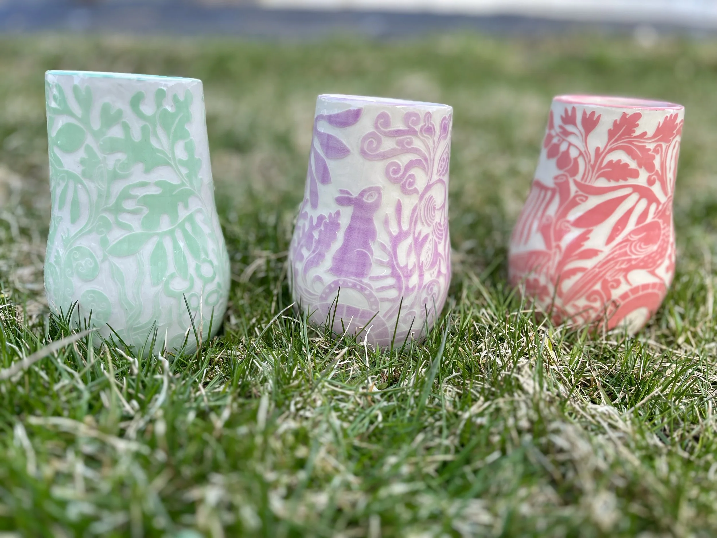 Blue Plum Pottery Vase filled with a Spring Bouquet