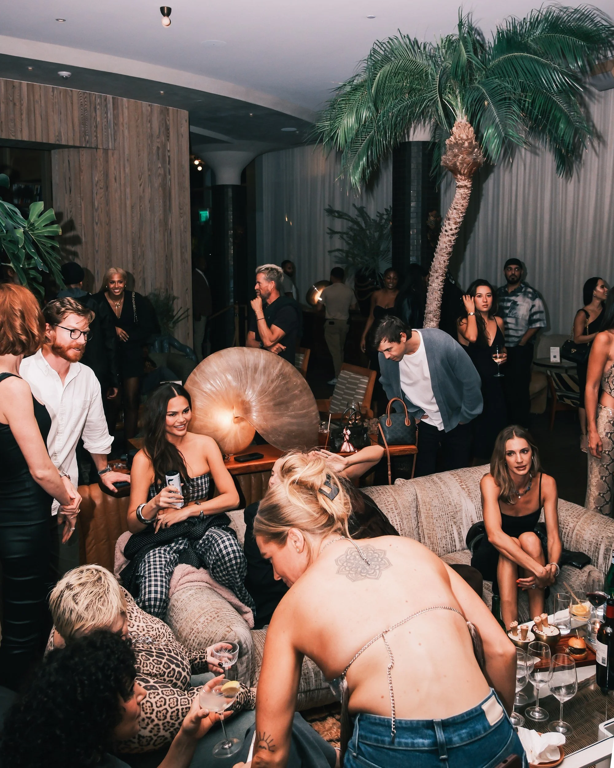 Guests in the lounge at John Legend's album release party