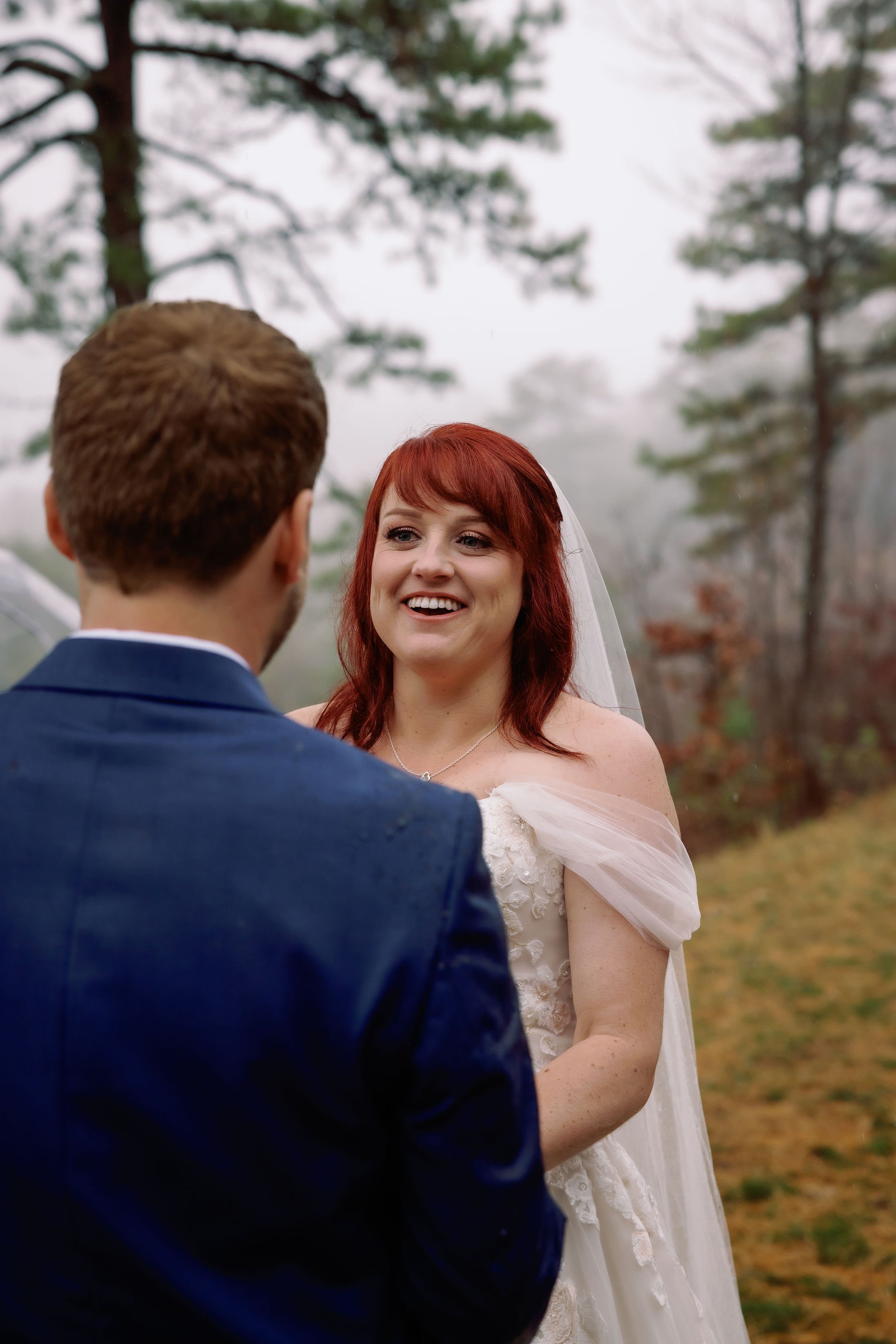 Gatlinburg-wedding-photographers-rainy-wedding-photos-bride-vows