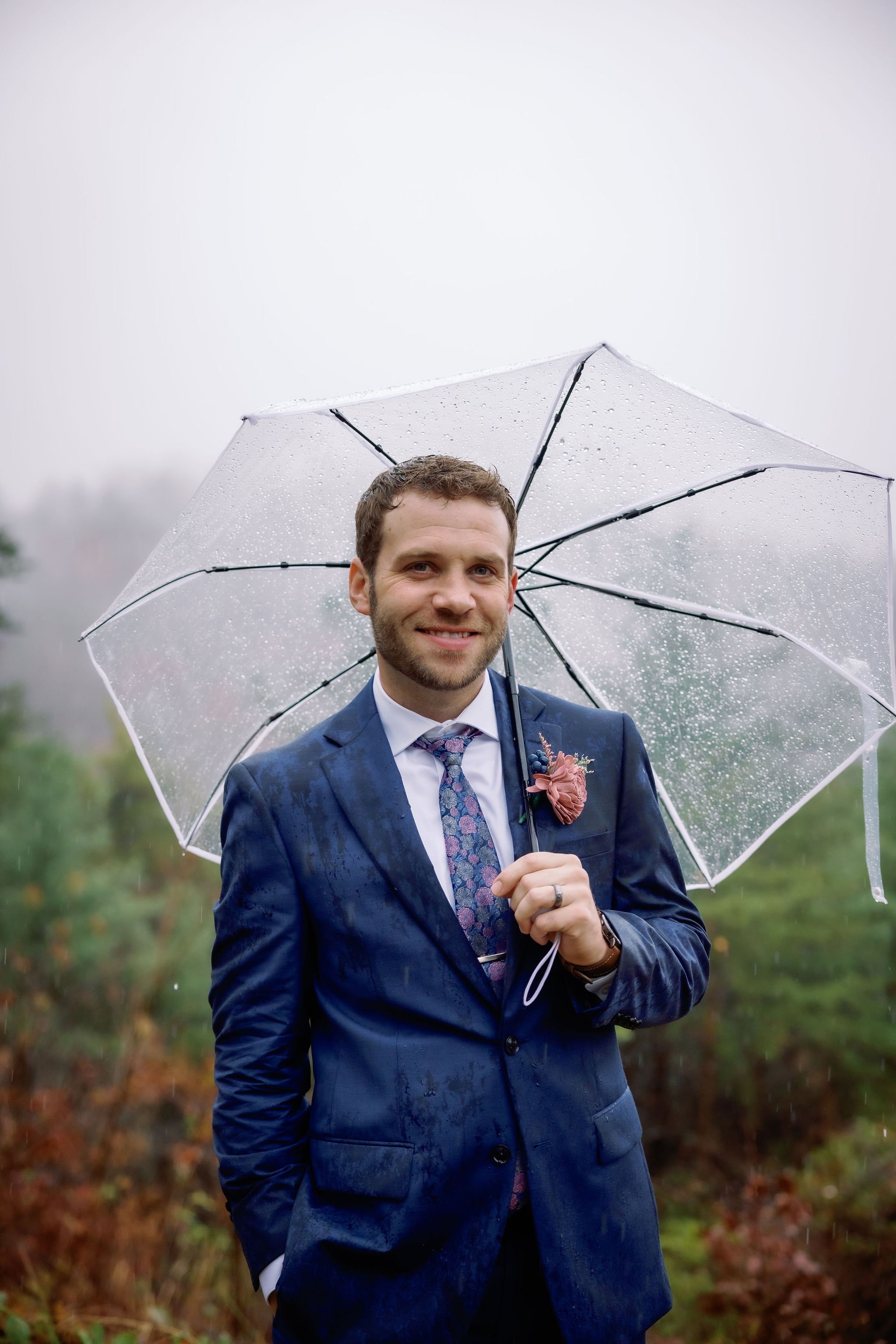 Gatlinburg-wedding-photographers-rainy-wedding-photos-grooms-suit