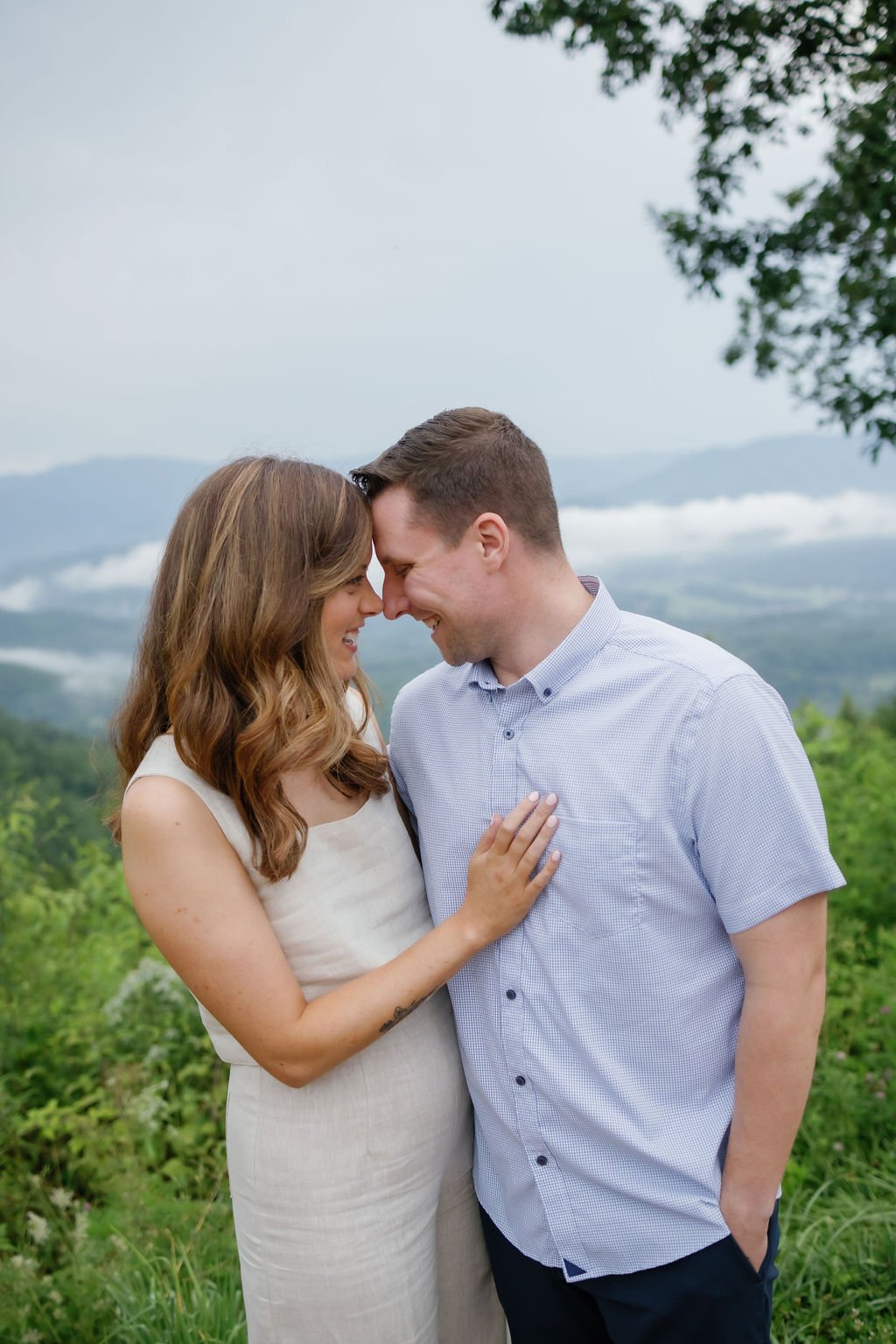gatlinburg-photographer-smoky-mountain-engagement-photos-couple-touching-foreheads