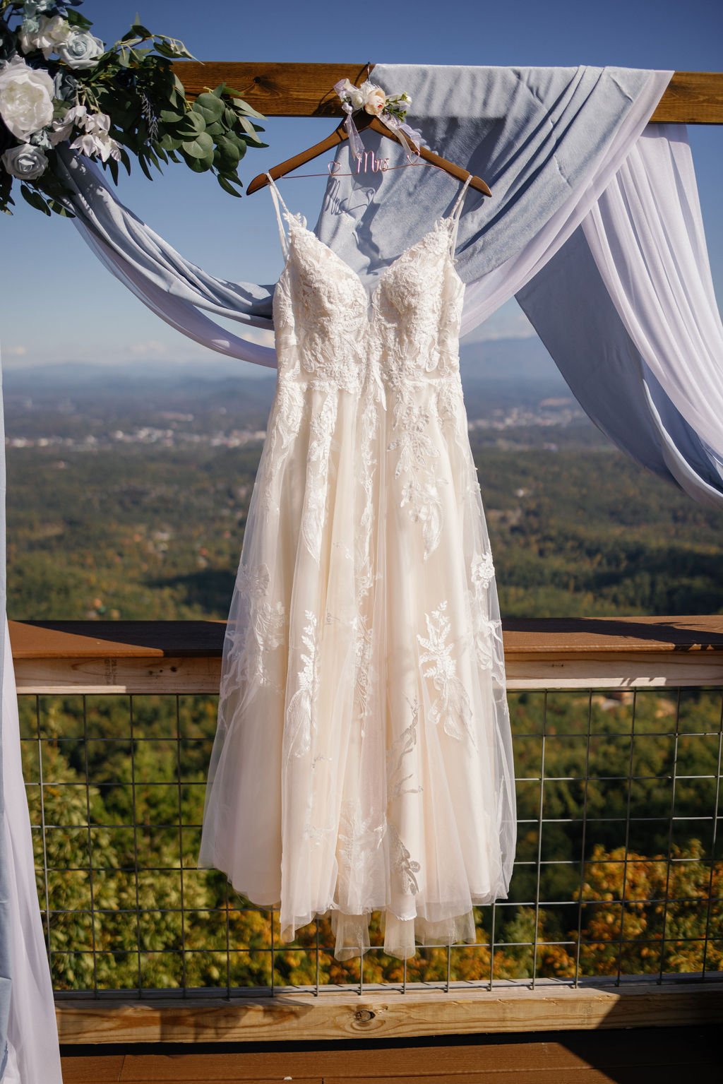 gatlinburg-photographers-airbnb-elopement-with-gatlinburg-photographers-wedding-dress-hanging