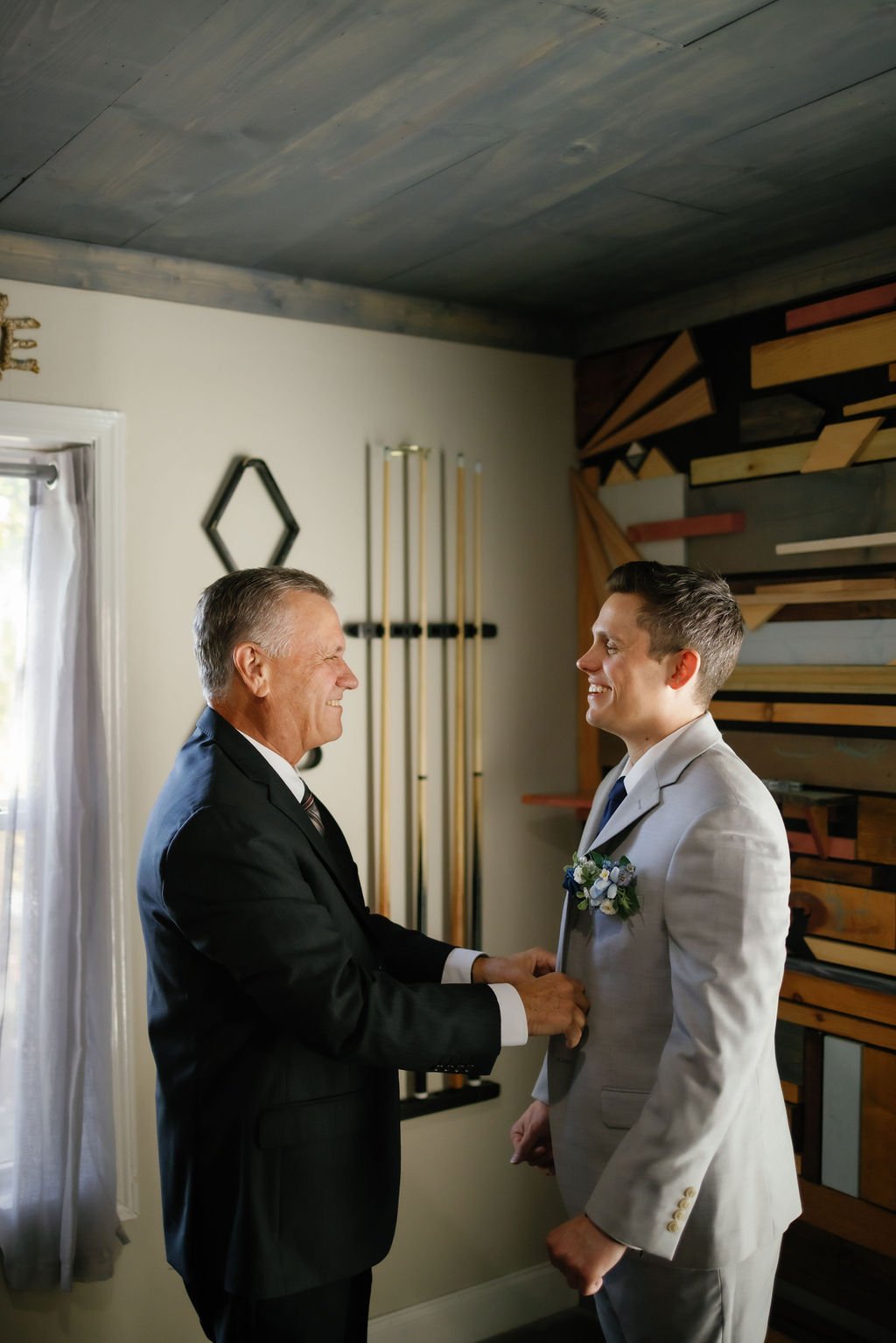 gatlinburg-photographers-airbnb-elopement-with-gatlinburg-photographers-groom-talking-to-father