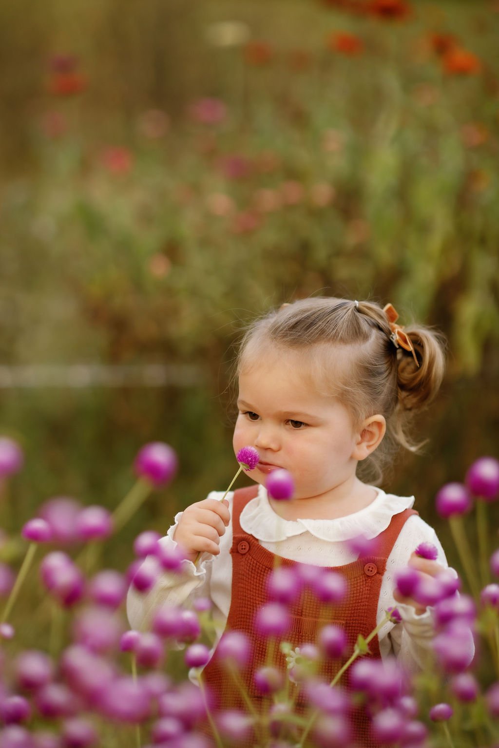 gatlinburg-photographers-widflower-photos-with-gatlinburg-photographer-young-girl-smelling-flowers