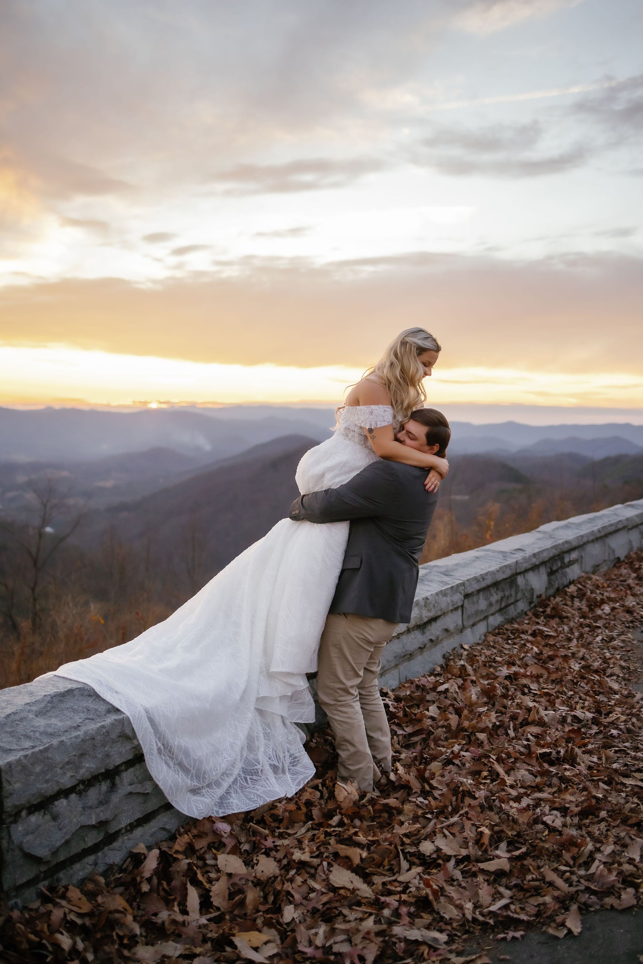 gatlinburg-wedding-photographer-gatlinburg-winter-wedding-groom-lifting-bride