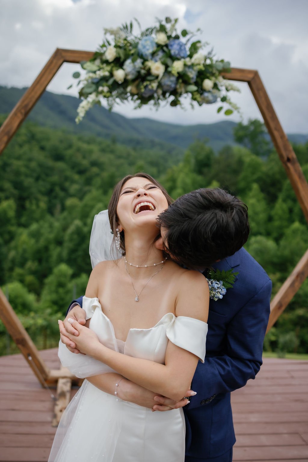 gatlinburg-photographer-mountain-mist-farms-wedding-venue-couple-laughing