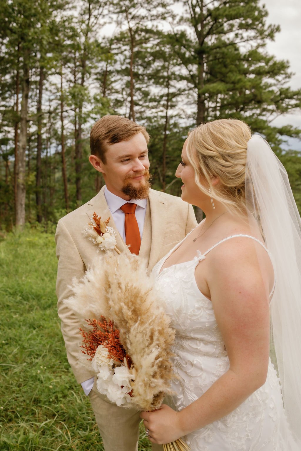 gatlinburg-photographer-foothills-parkway-through-the-year-bride-smiling-at-groom