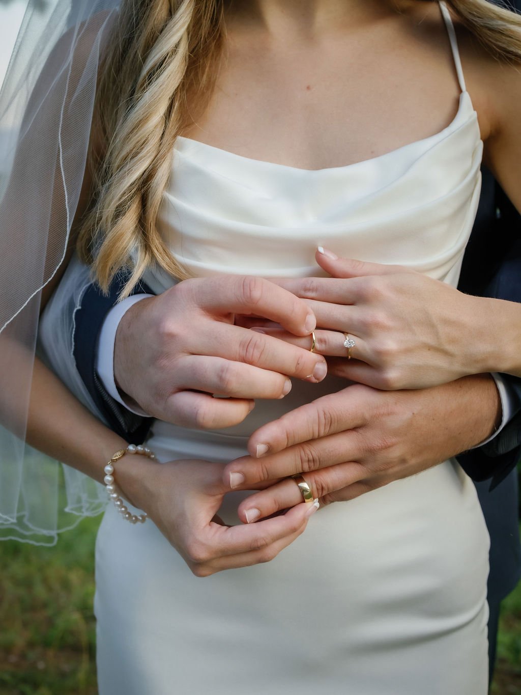 gatlinburg-photographer-foothills-parkway-through-the-year-bride-groom-wedding-rings