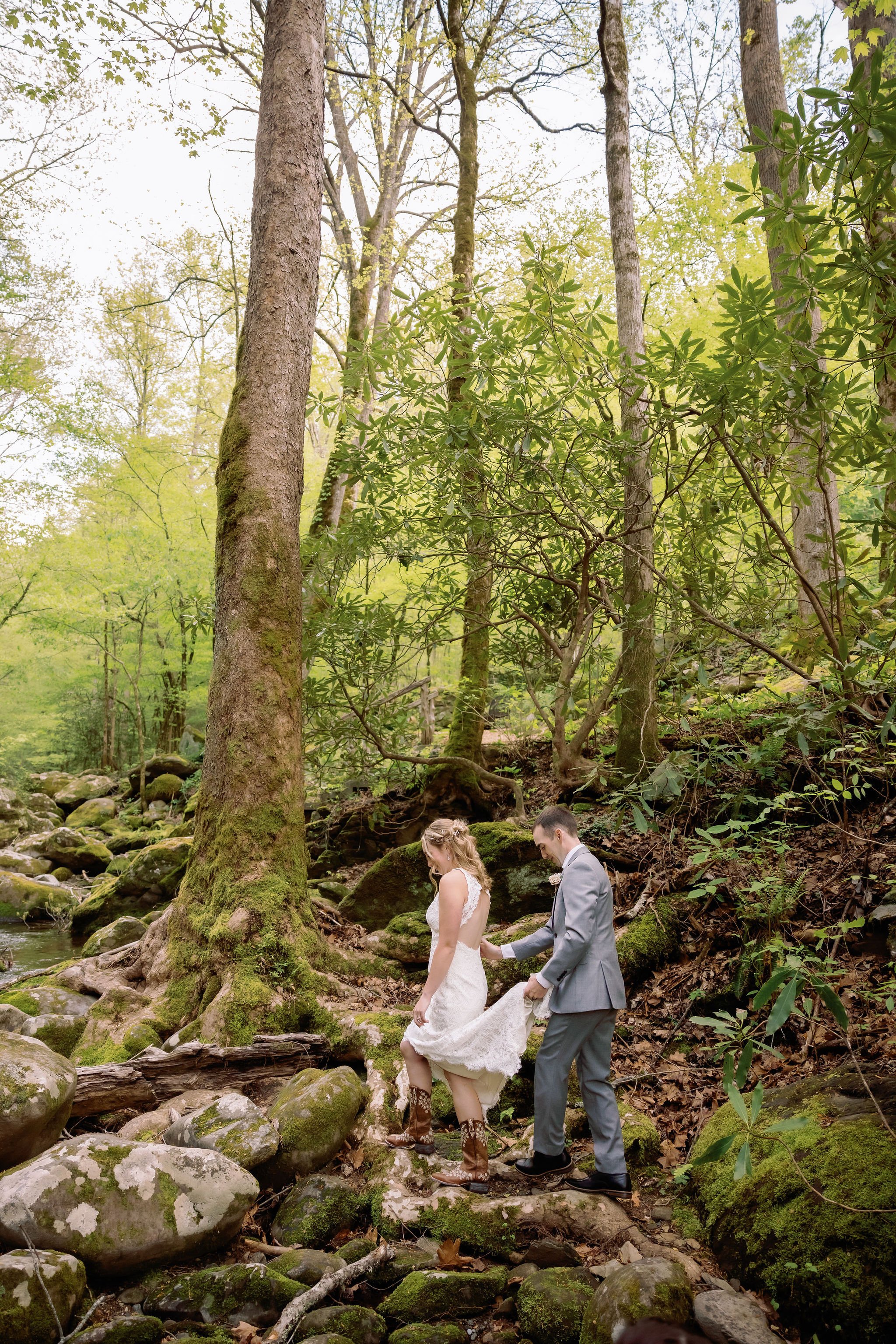 gatlinburg-photographer-6-myths-about-eloping-bride-groom-walking-in-forest