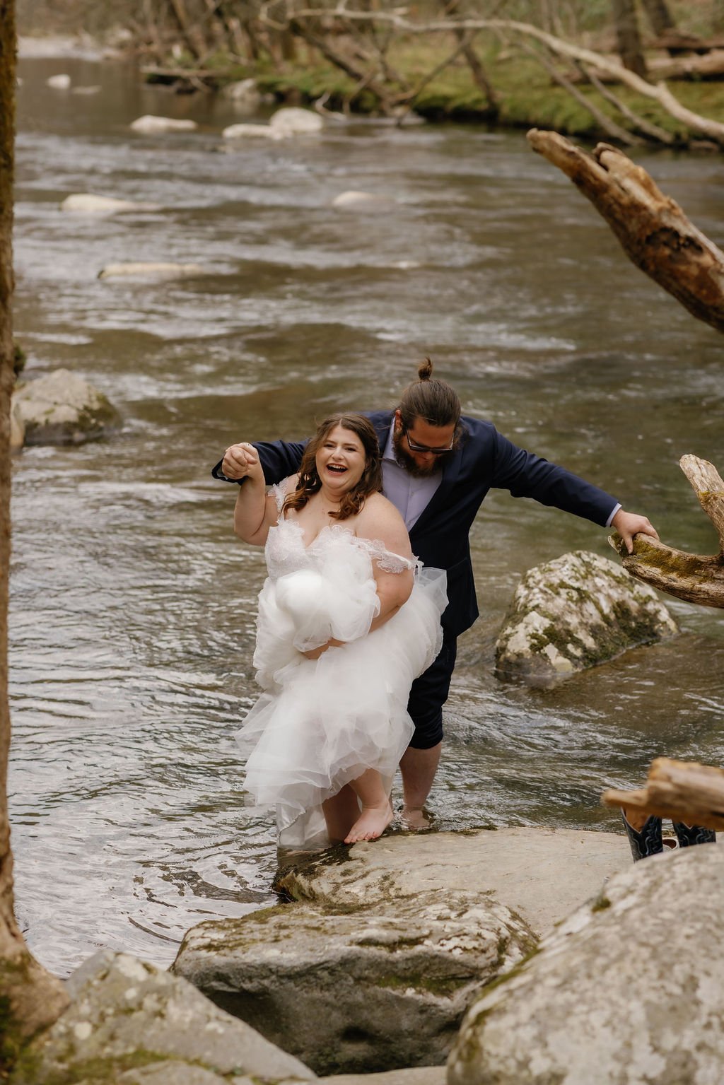 gatlinburg-photographer-5-signs-you-may-want-to-elope-to-gatlinburg-couple-walking-through-water