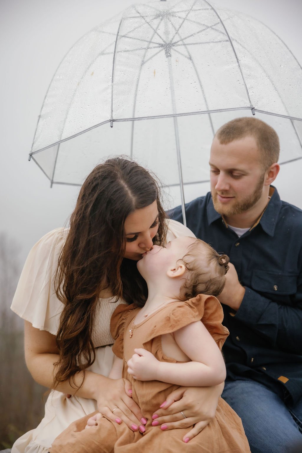 gatlinburg-family-photographer-tips-for-family-photos-with-a-toddler-mother-kissing-toddler