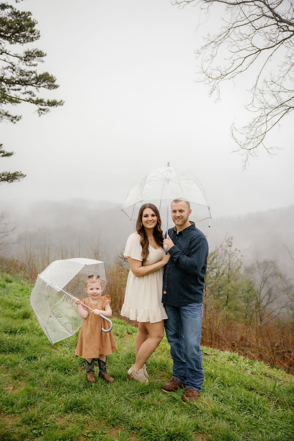 gatlinburg-family-photographer-tips-for-family-photos-with-a-toddler-toddler-holding-umbrella