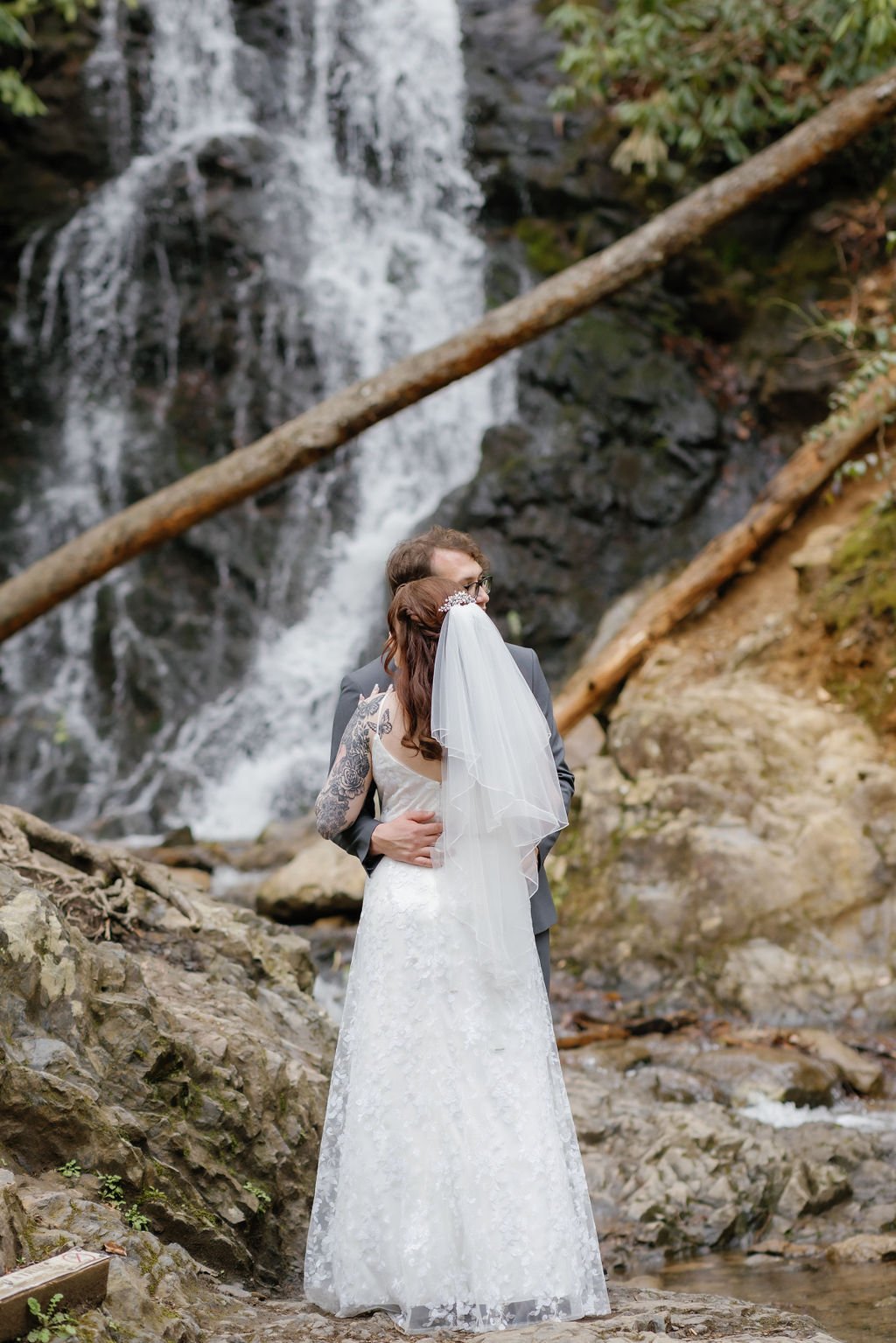 gatlinburg-photographer-waterfall-elopement-in-the-smoky-mountains-groom-holding-bride
