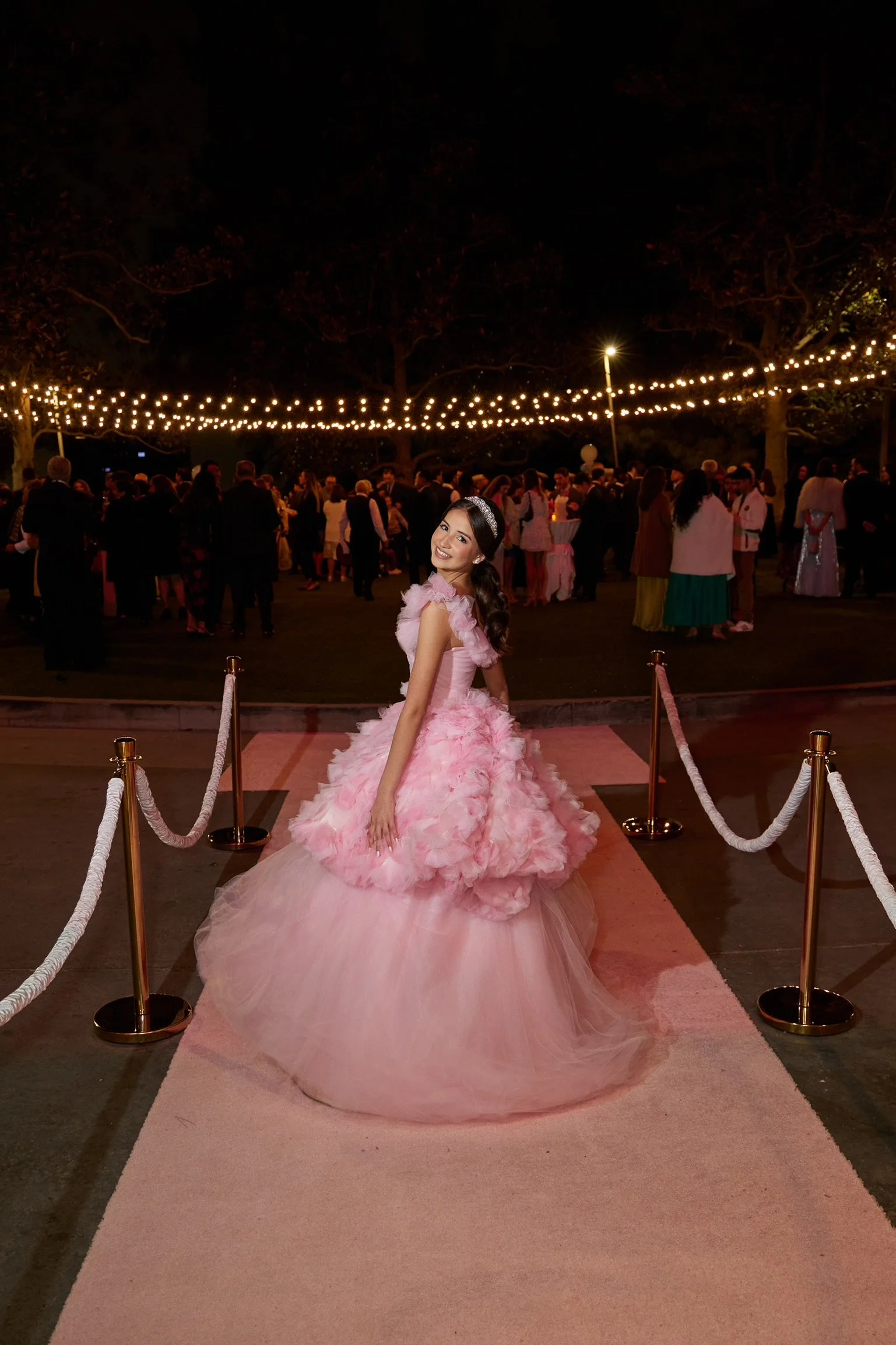 Couture craftsmanship meets youthful elegance in this custom quinceañera gown designed by RMINÉ.