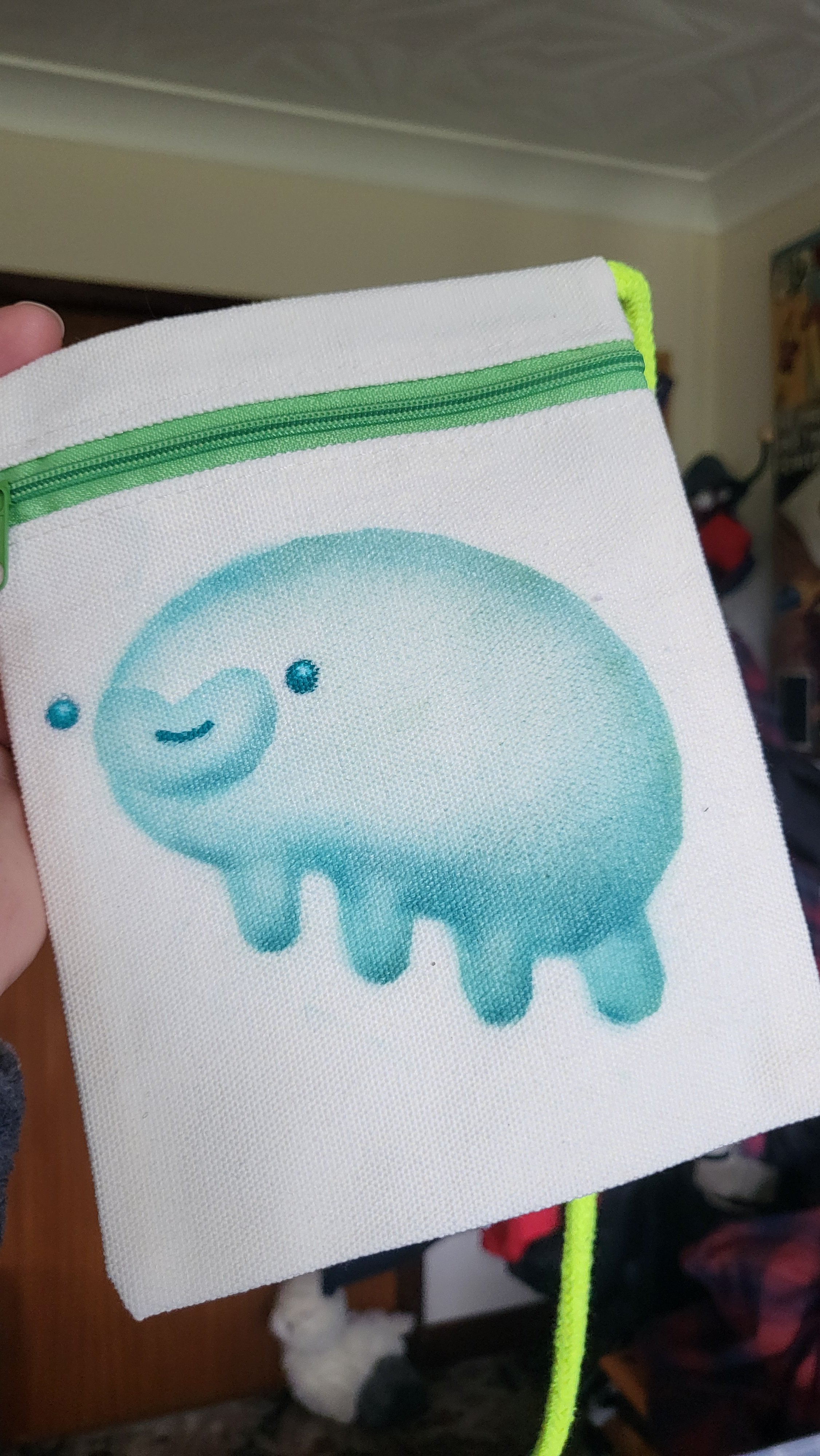 Handpainted mini zipped pouches