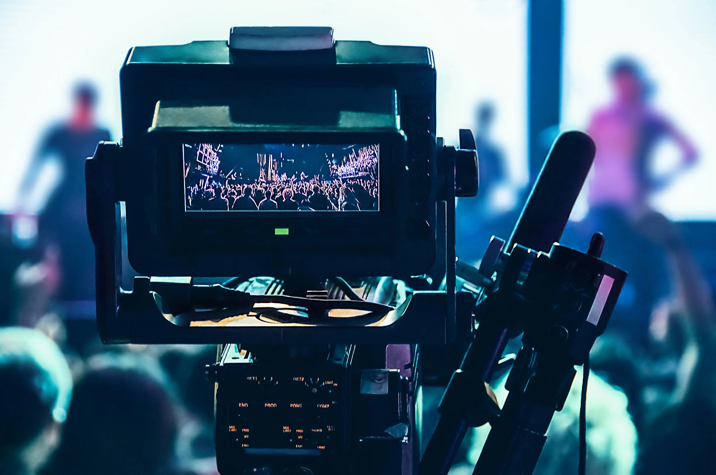 Professional video camera monitor displaying a live broadcast of a crowded event production in Pittsburgh by VAMP Media.