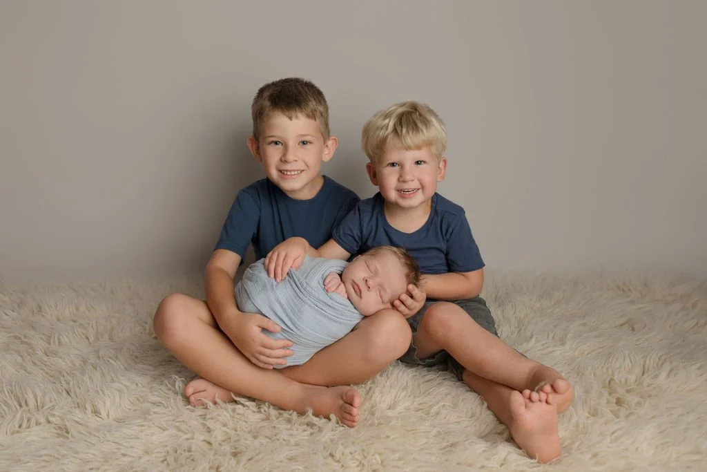 I have had the BEST toddlers and siblings in studio lately for newborn sessions. 
I like to be completely honest and I won't lie to parents that sibling photos may be "easy" during a newborn session. I consider it organized chaos no matter 