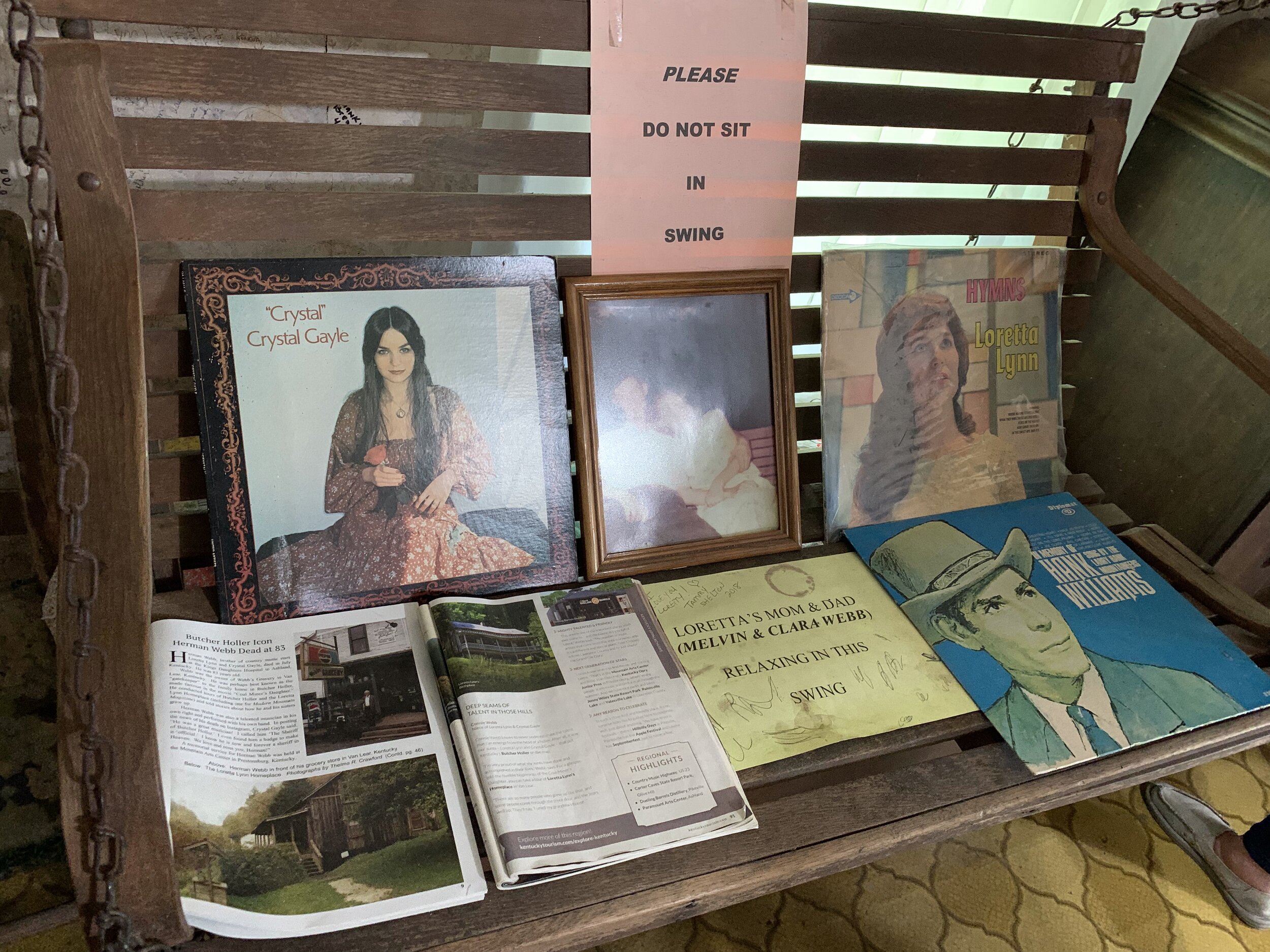 Some Memorabilia Sitting on the House's Original Porch Swing 