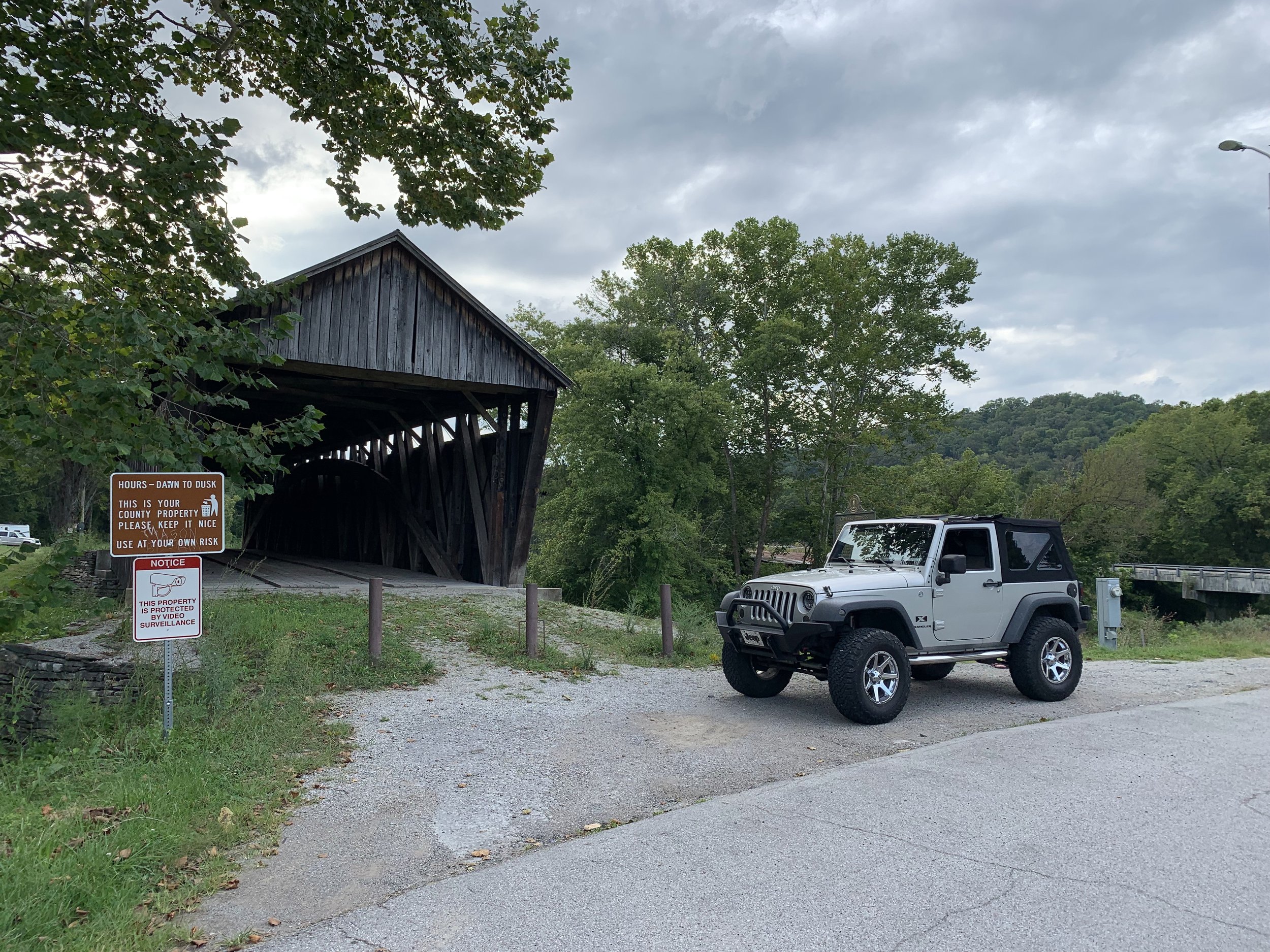 The Jeep Parked in Front of the Bridge