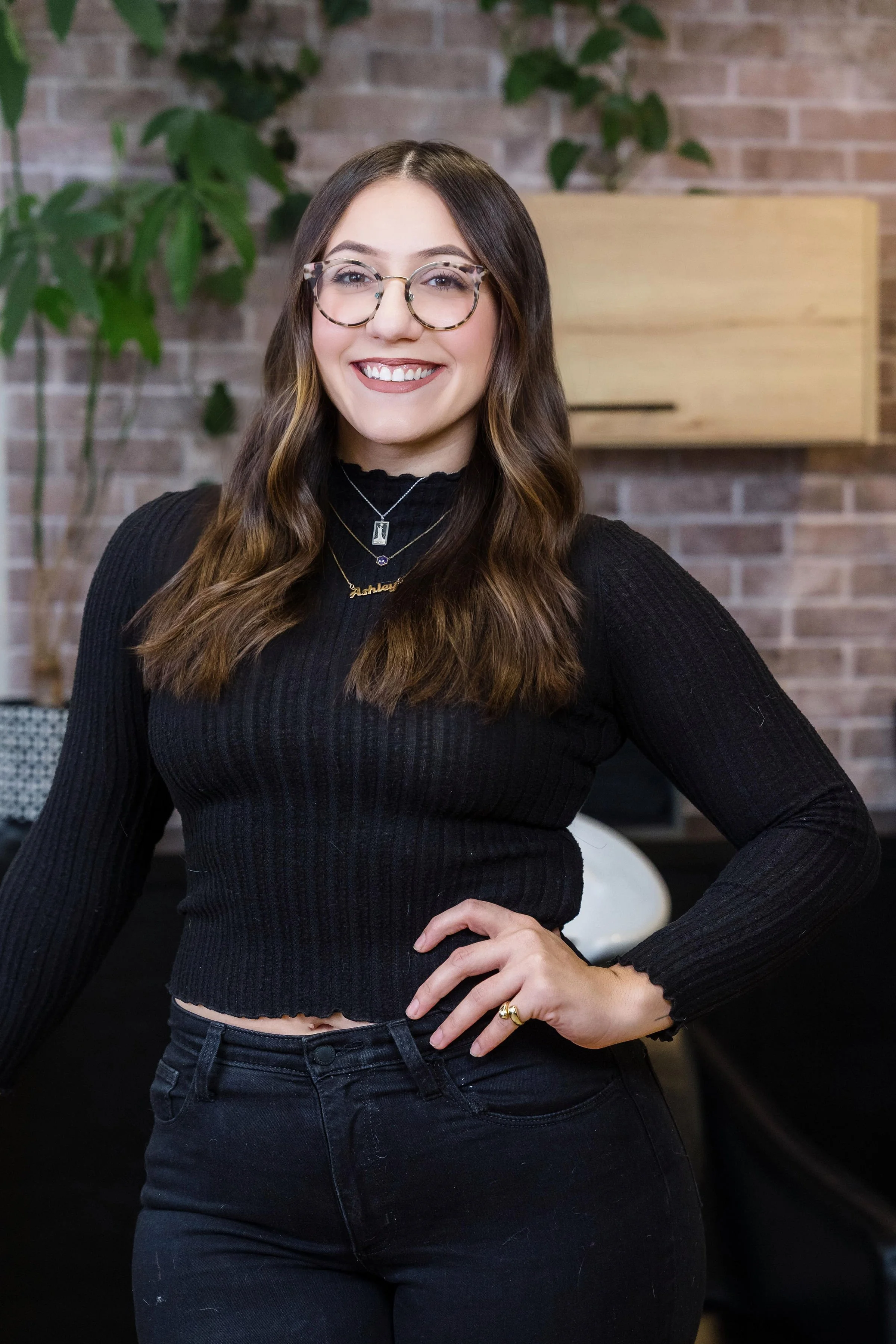 Ashley hairdresser posing for headshot.