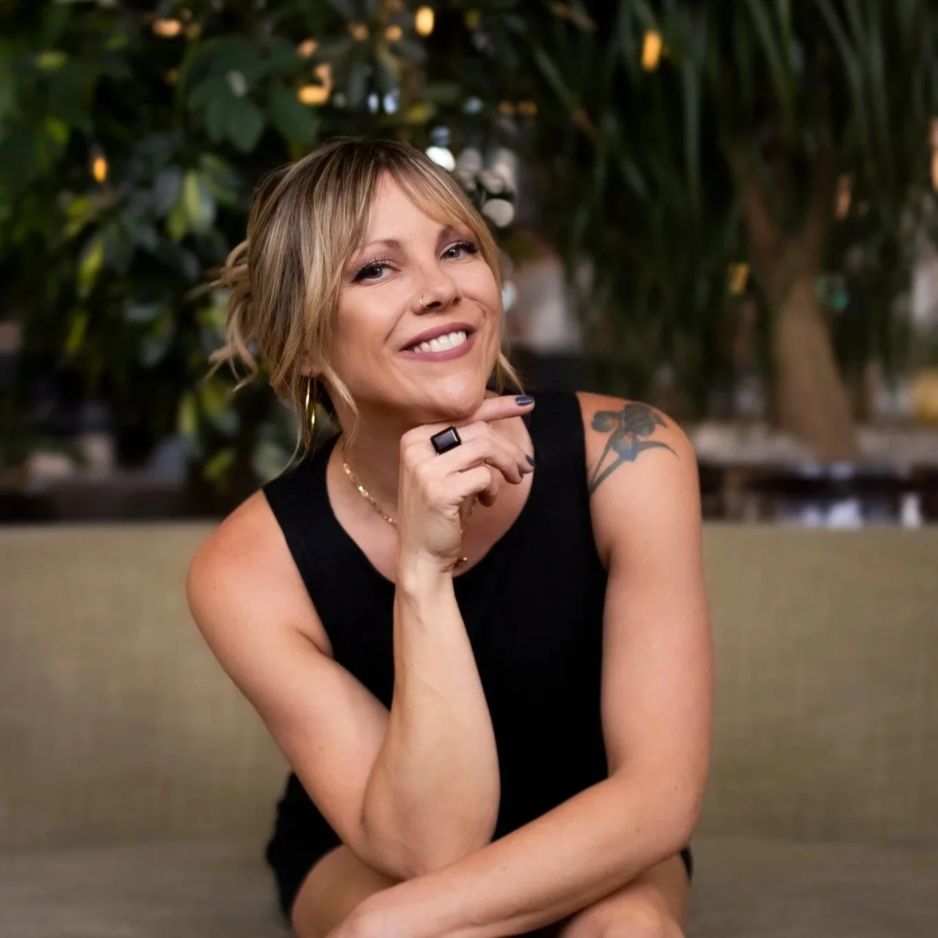 Raechel hairdresser posing for a headshot picture.