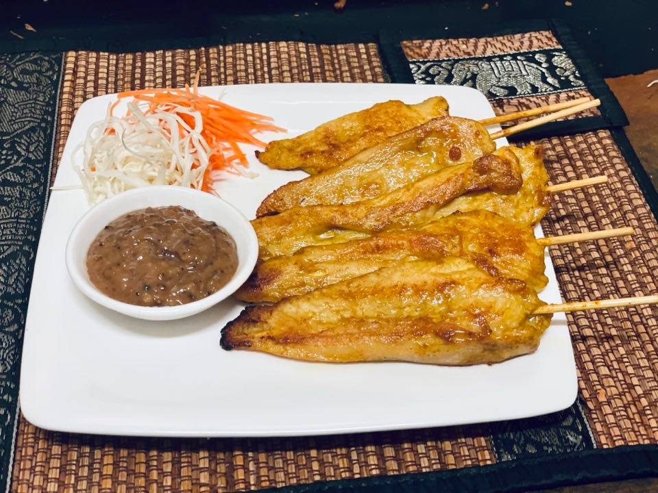 3. Chicken Satay (5) - Marinated satay chicken slices on a skewer. Served with our homemade sweet peanut sauce