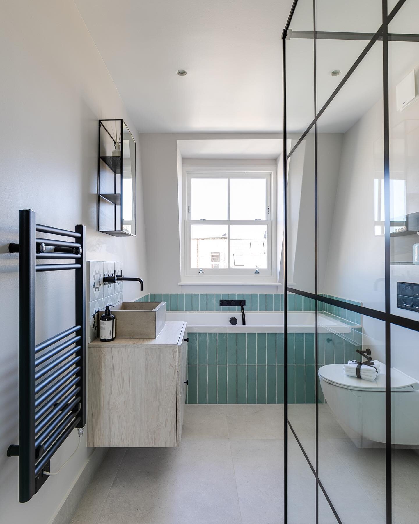 Escape to a peaceful oasis with our stylish industrial shower screens

.⁠
.⁠
.⁠
 #projectlondon #homerenovation #interiordesign #houseextensions #maximisespace #greenkitchen #slidingdoors #summerhomestyle #nottinghillhomes #homeimprovement #homedecor