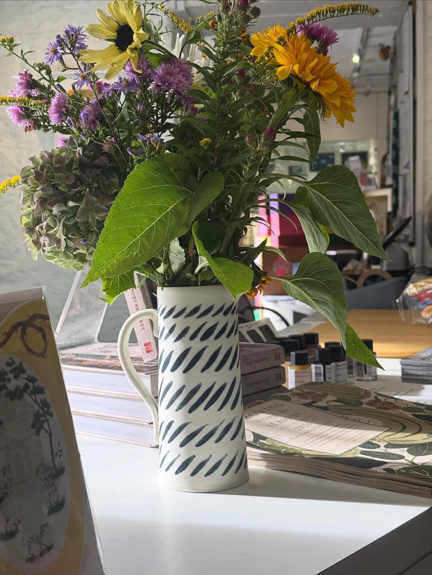 Home from home&hellip; on the shop counter at Make Southwest with garden flowers in the jug.

#flowerjugs