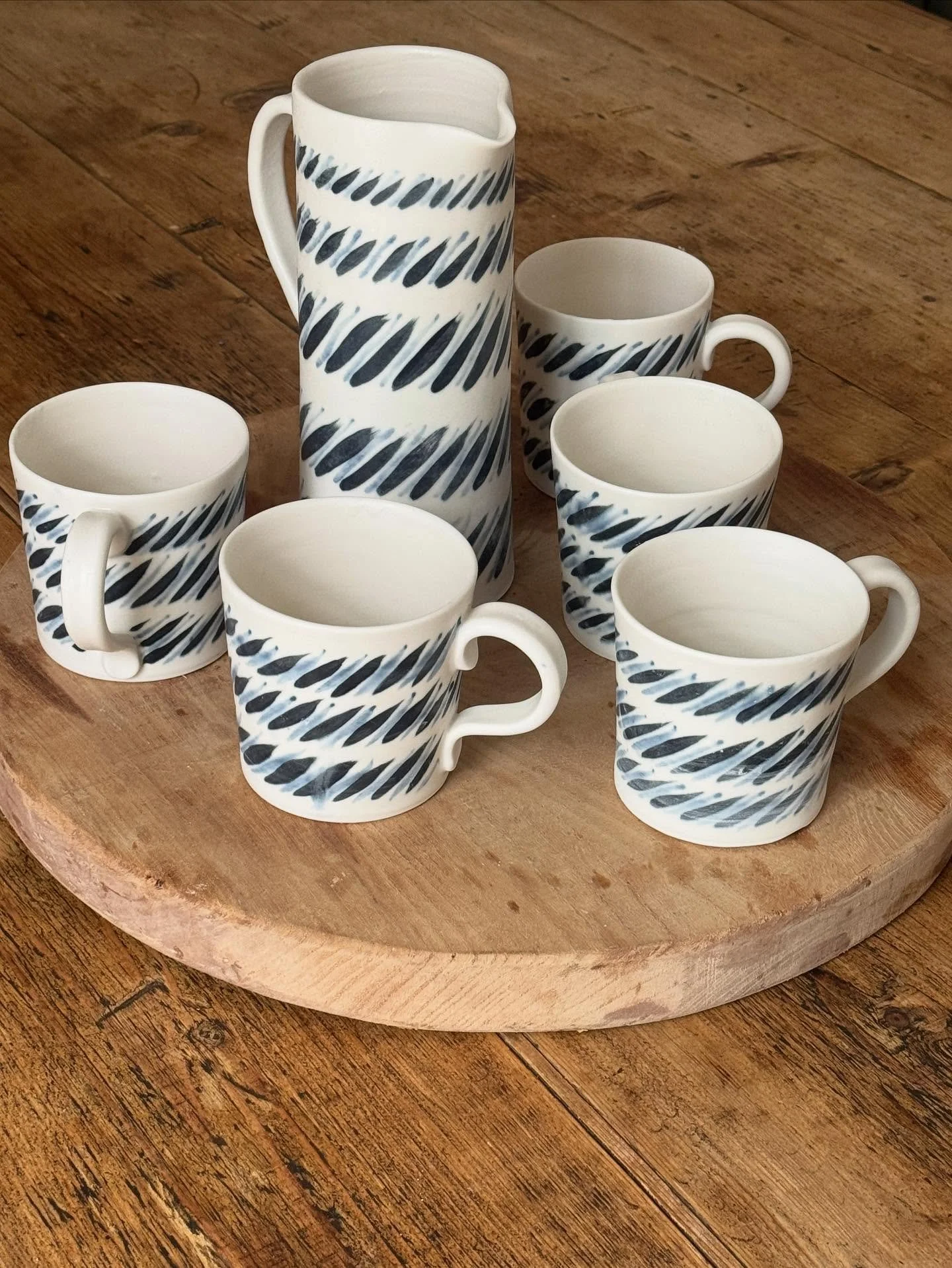 Jug with cups 

@cruxcraftfair 
#thrownporcelain