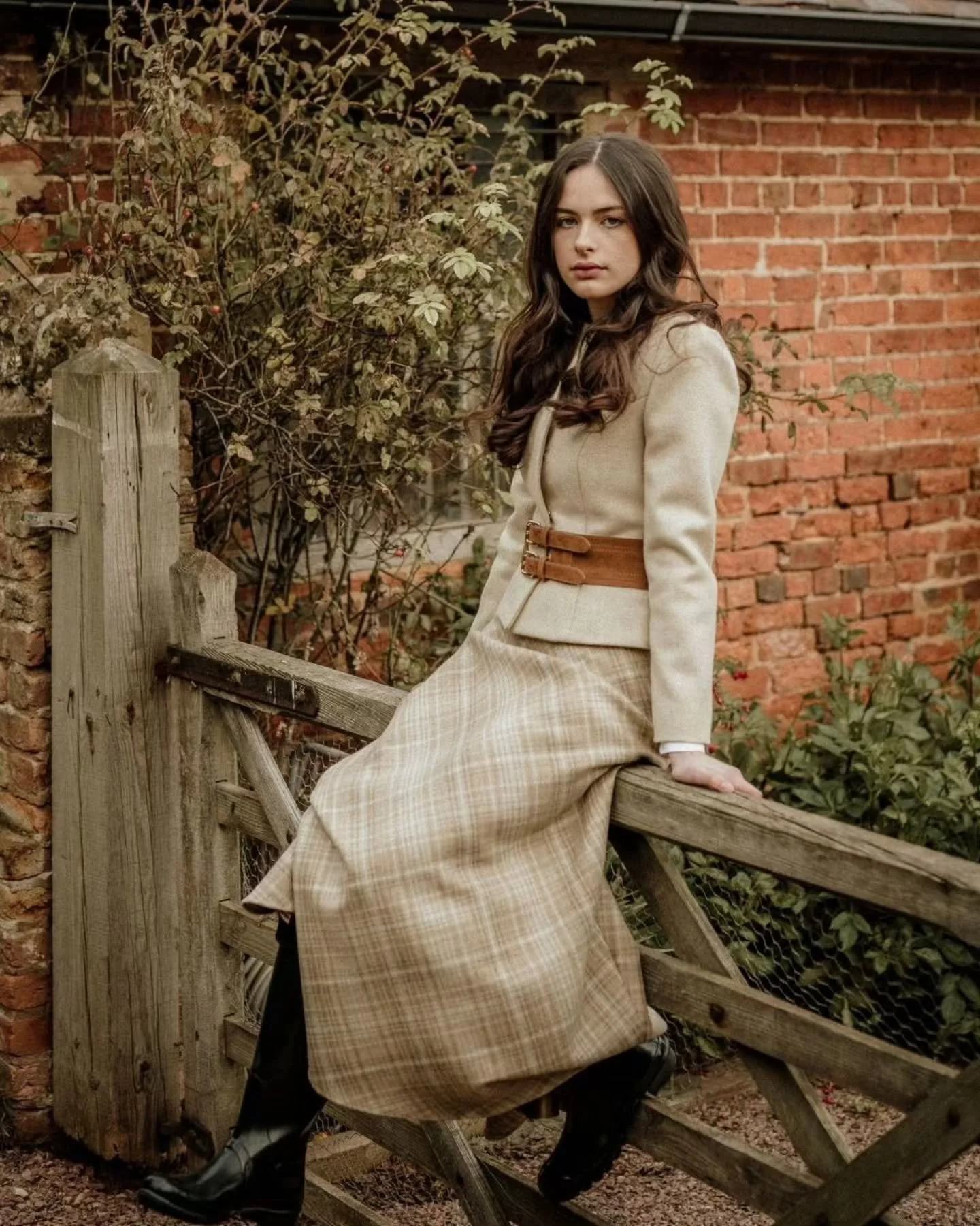 From parlour to paddock gate.

Soft tweeds, quiet tailoring, and the hush of old brick walls &mdash; where countryside stories linger in every thread. 

The Jane Jacket and Elizabeth Skirt, captured beautifully by @katecullenstyle , were made to wand