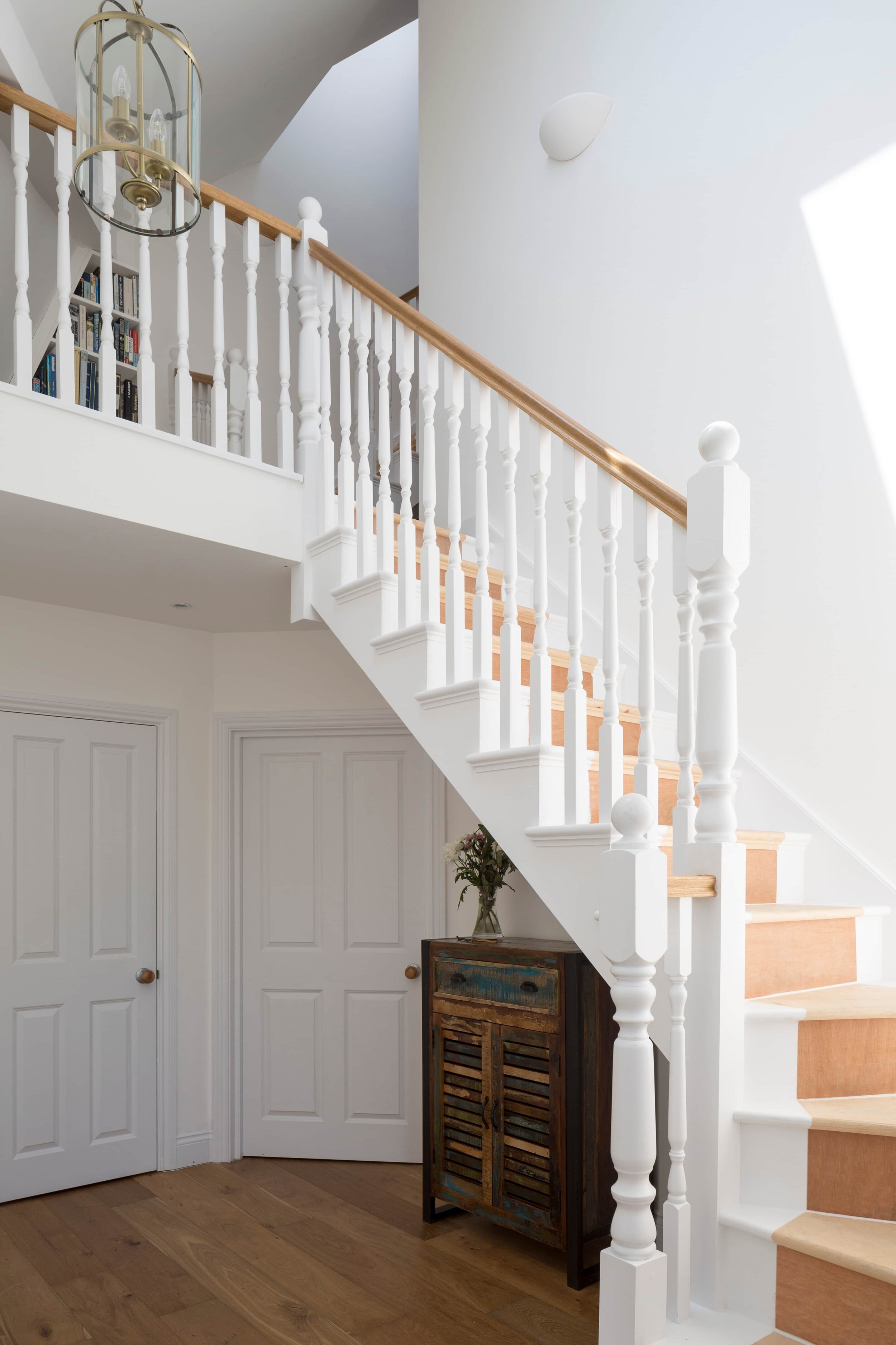 hall staircase stair balustrade timber Sustainable Family Home Cave Cooperative