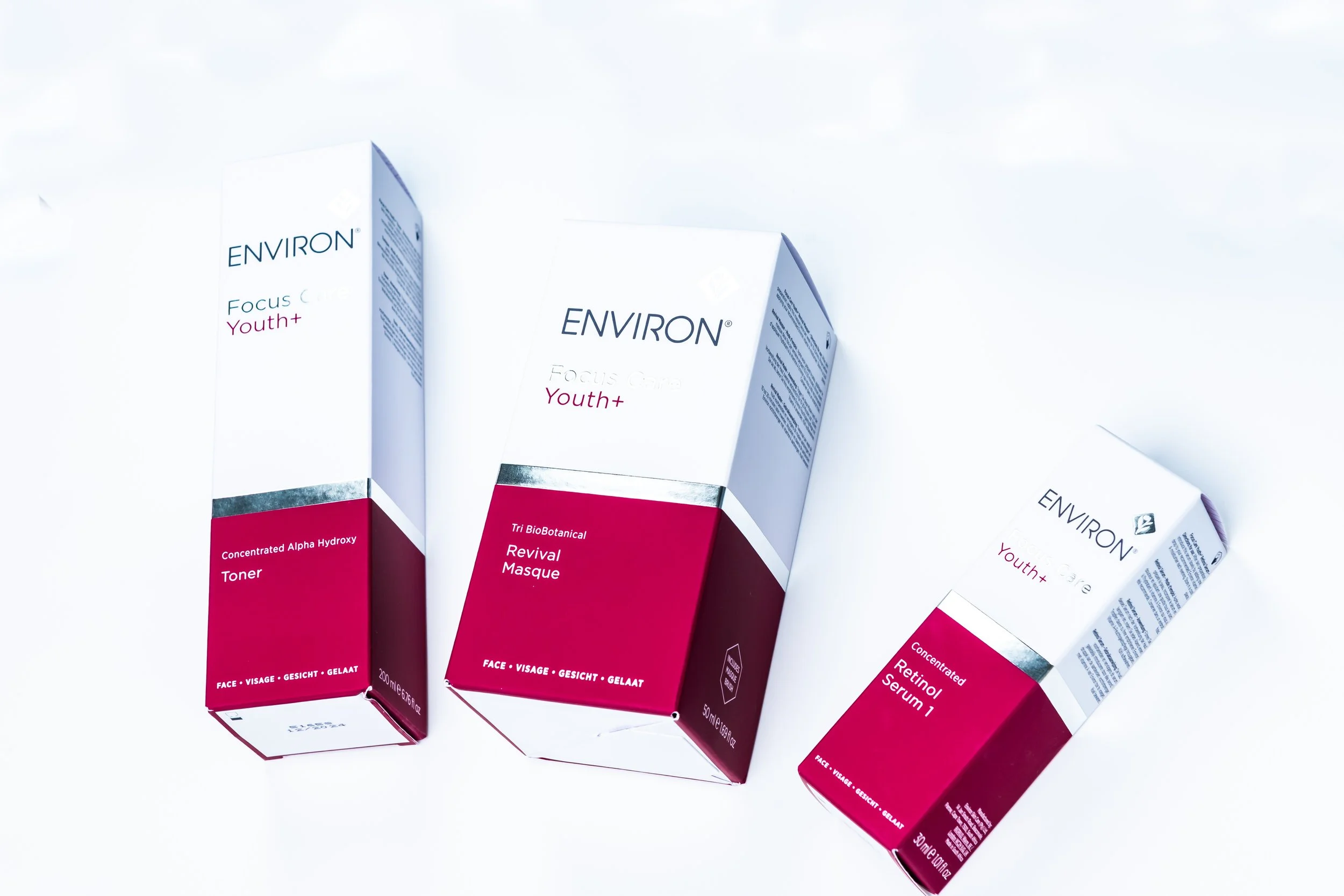 3 Environ skincare products: toner, mask, and retinol in a burgundy-colored box.