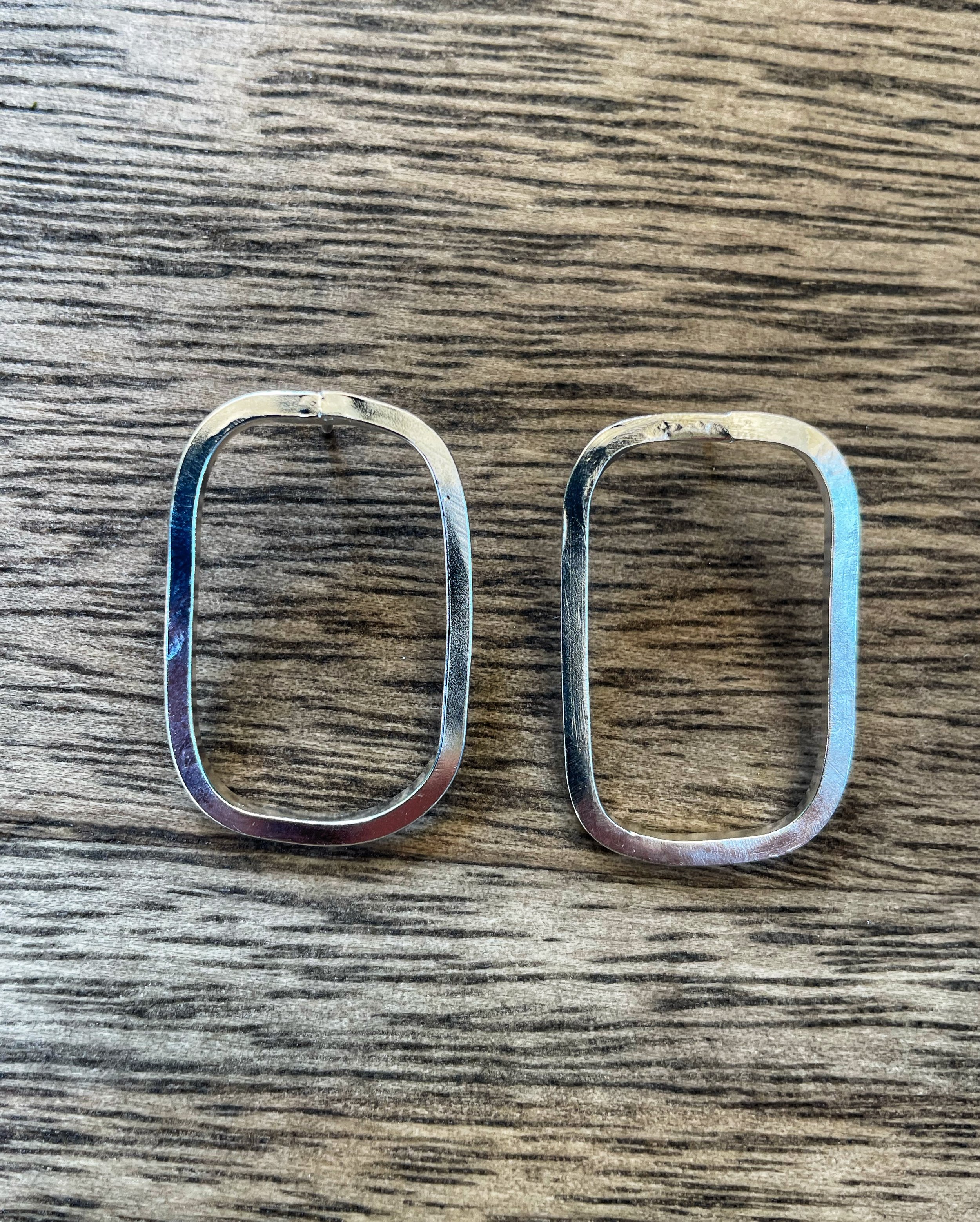 Curved silver stud earrings
