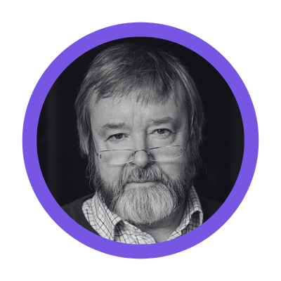 Black and white portrait of Iain McGilchrist, wearing glasses and a checkered shirt, surrounded by a purple circular border.