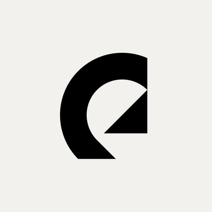 Abstract black and white geometric design with partial circle and slash.