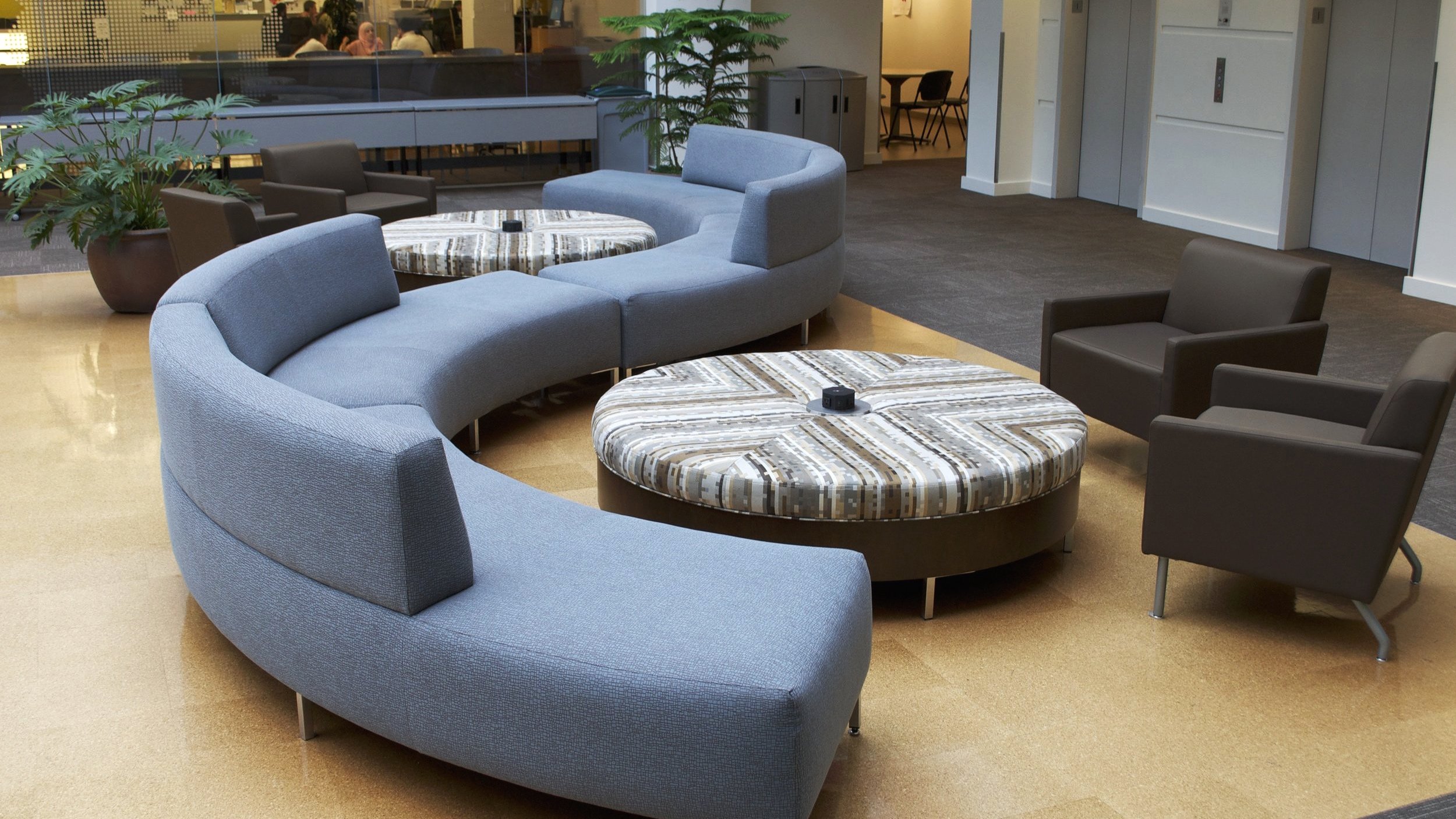 CUSTOM KENZIE LOUNGE SEATING + OVERSIZED OTTOMANS WITH INTEGRATED DATA UNITS
