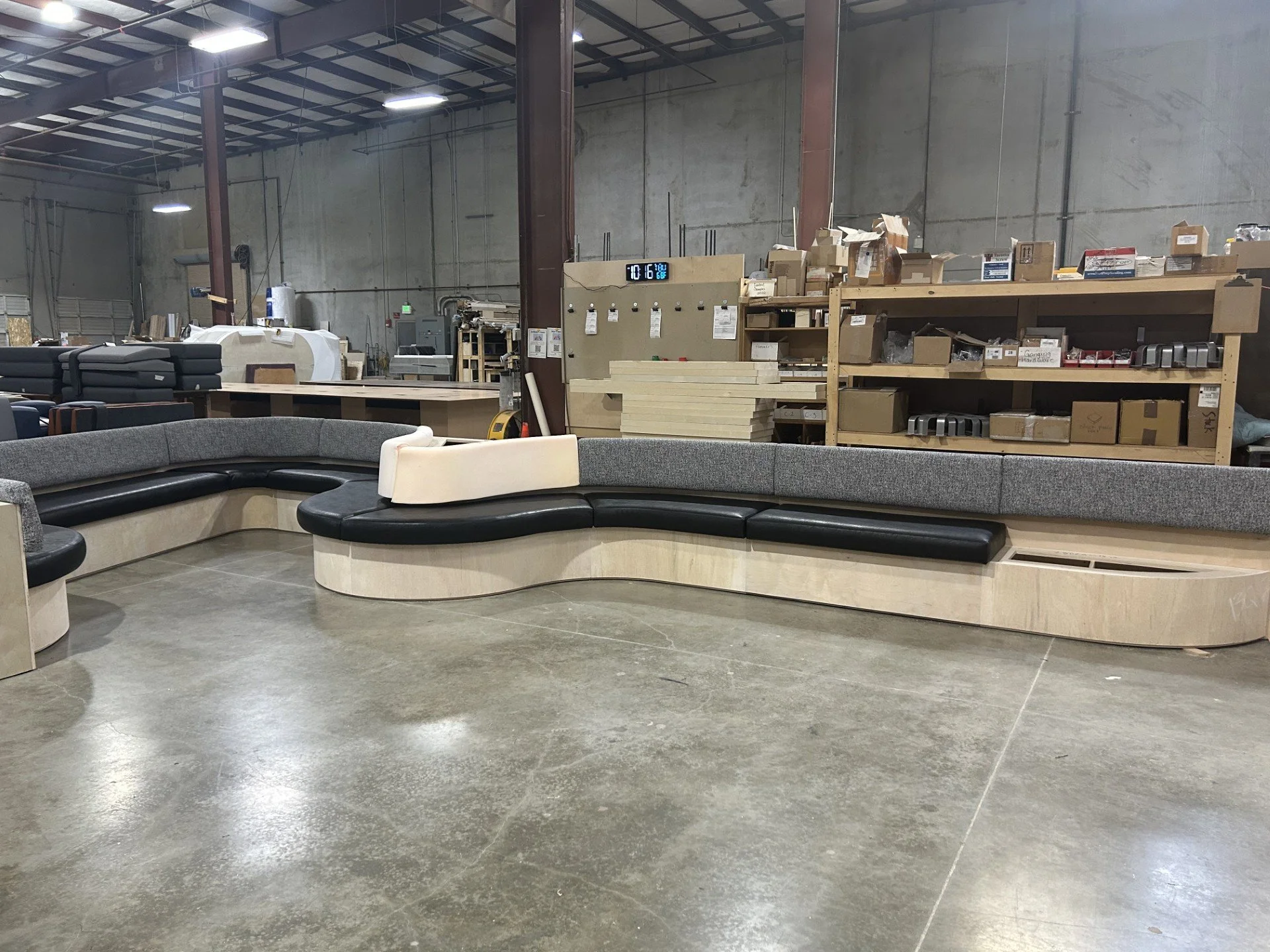 CUSTOM CURVED BUILD IN BANQUETTE WITH WHITE OAK VENEER BOX BASE AND MULTIPLE FABRICS