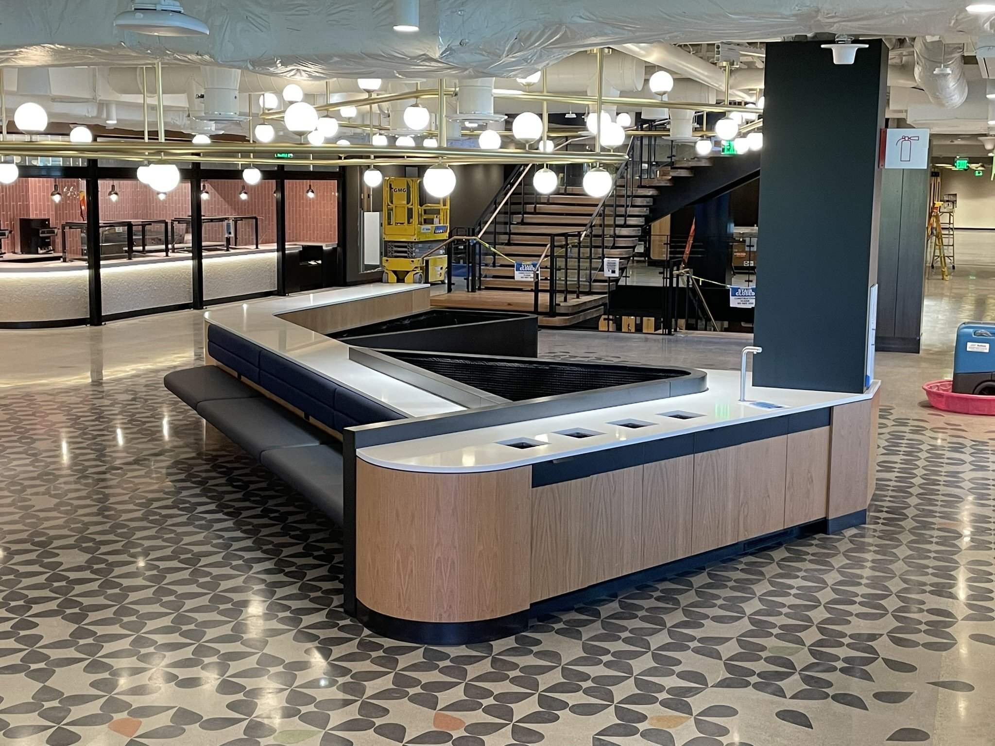 CUSTOM BANQUETTE, PLANTER, AND LRC CABINET COMBINATION WITH PS WHITE OAK VENEER CABINET AND BANQUETTE BASE, LUUM HOMAGE SEAT BACKS, AND SINA PERSON EUREKA 389 SEAT CUSHIONS, METAL PLANTER