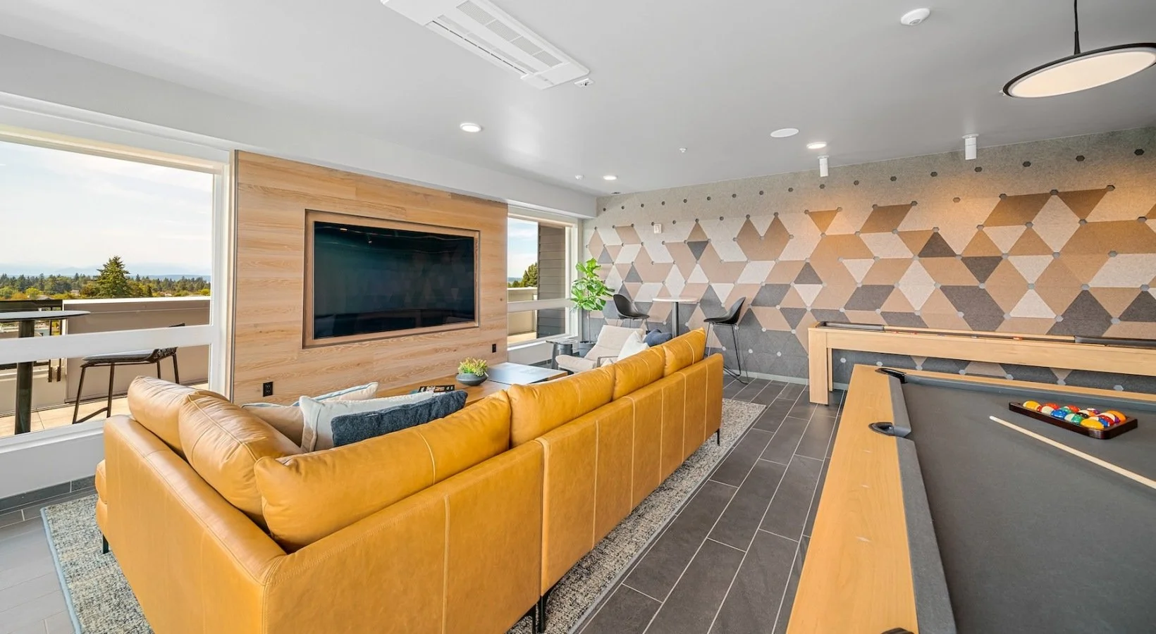 WINDOW CASINGS, TV WALL SURROUND TONGUE AND GROOVE + TRIM IN CROWN HILL APARTMENT BUILDING