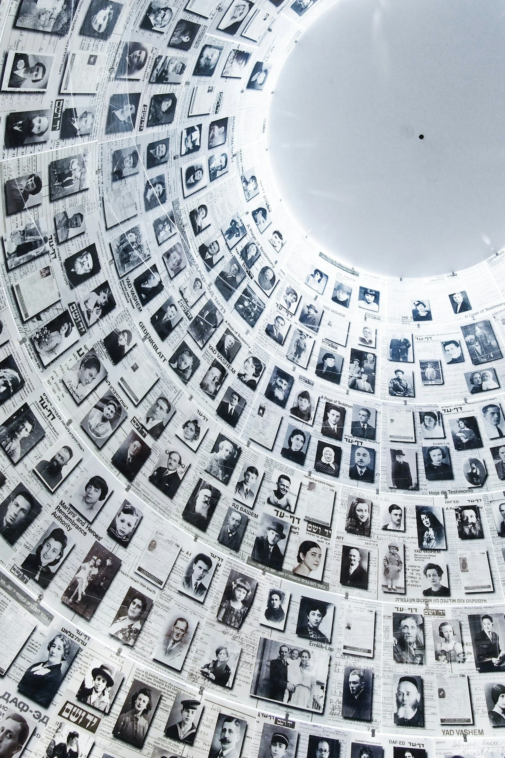 wall of holocaust victims frames backdrop of existential therapy