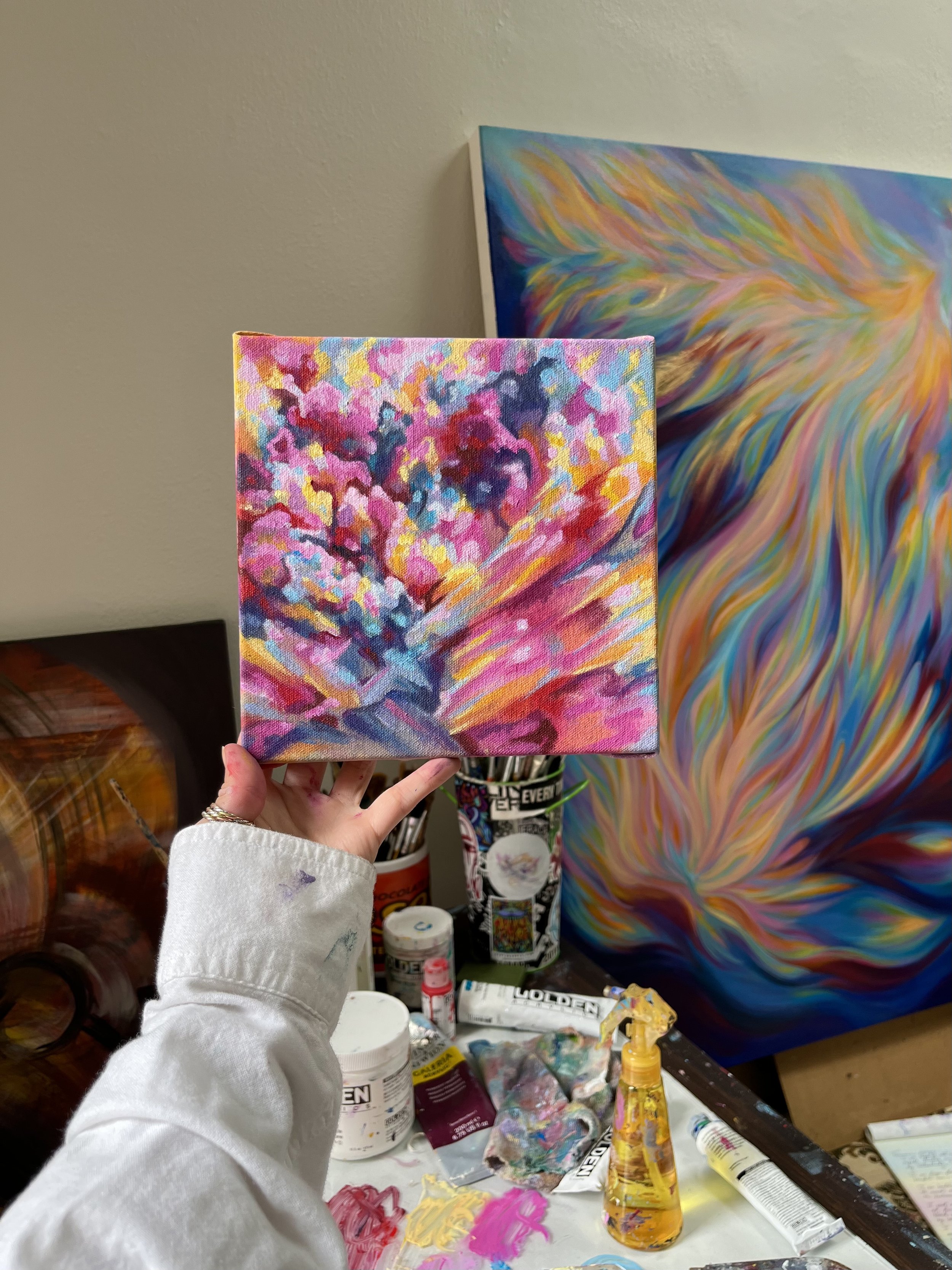 Sugarhigh painting in hand.jpeg