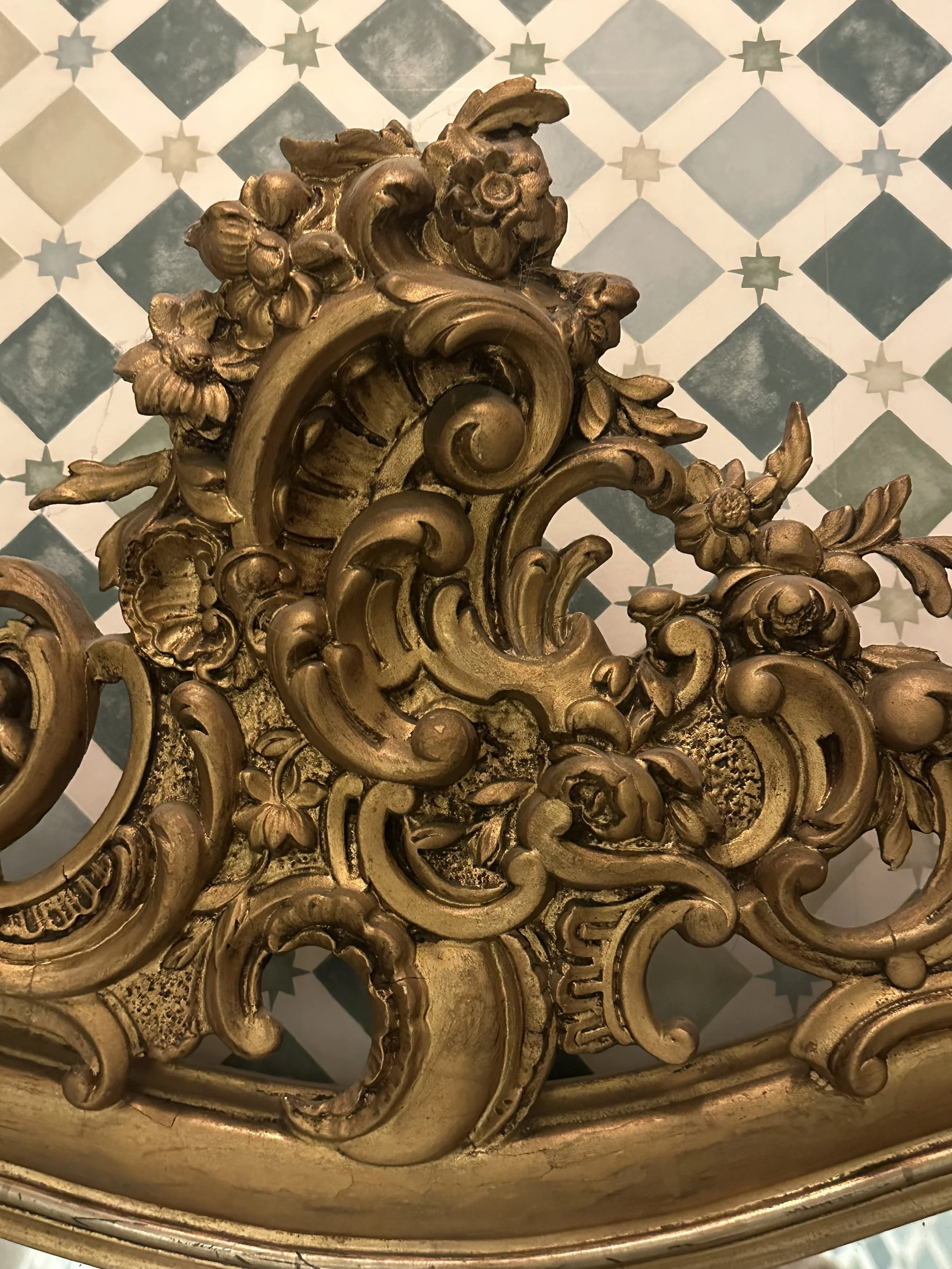 A French Rococo Giltwood Mirror with Bevelled Edge, Louis XV Period