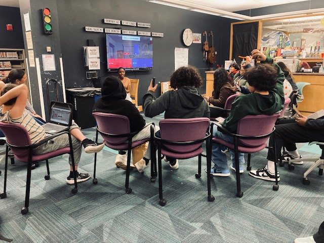 An evening session of REAL TALK, a youth-led forum for addressing issues important to teens at the Waltham Public Library. LITT pitches in with food, outside facilitators to cover tough topics, and stipends for teen leaders.