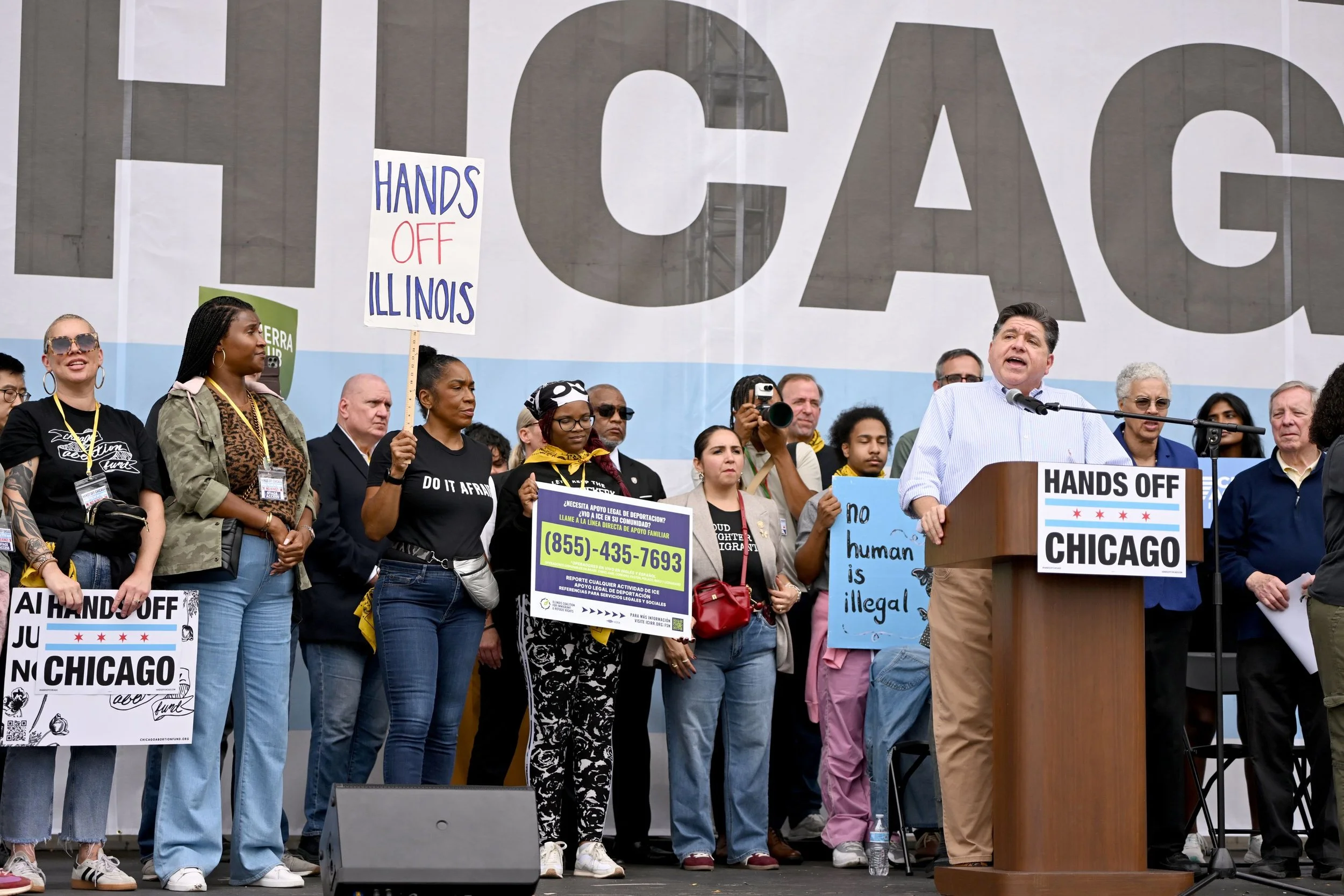 IL Governor JB Pritzker speaks at the Hands Off Chicago No Kings rally and march on October 18, 2025 along with other community leaders and elected officials.