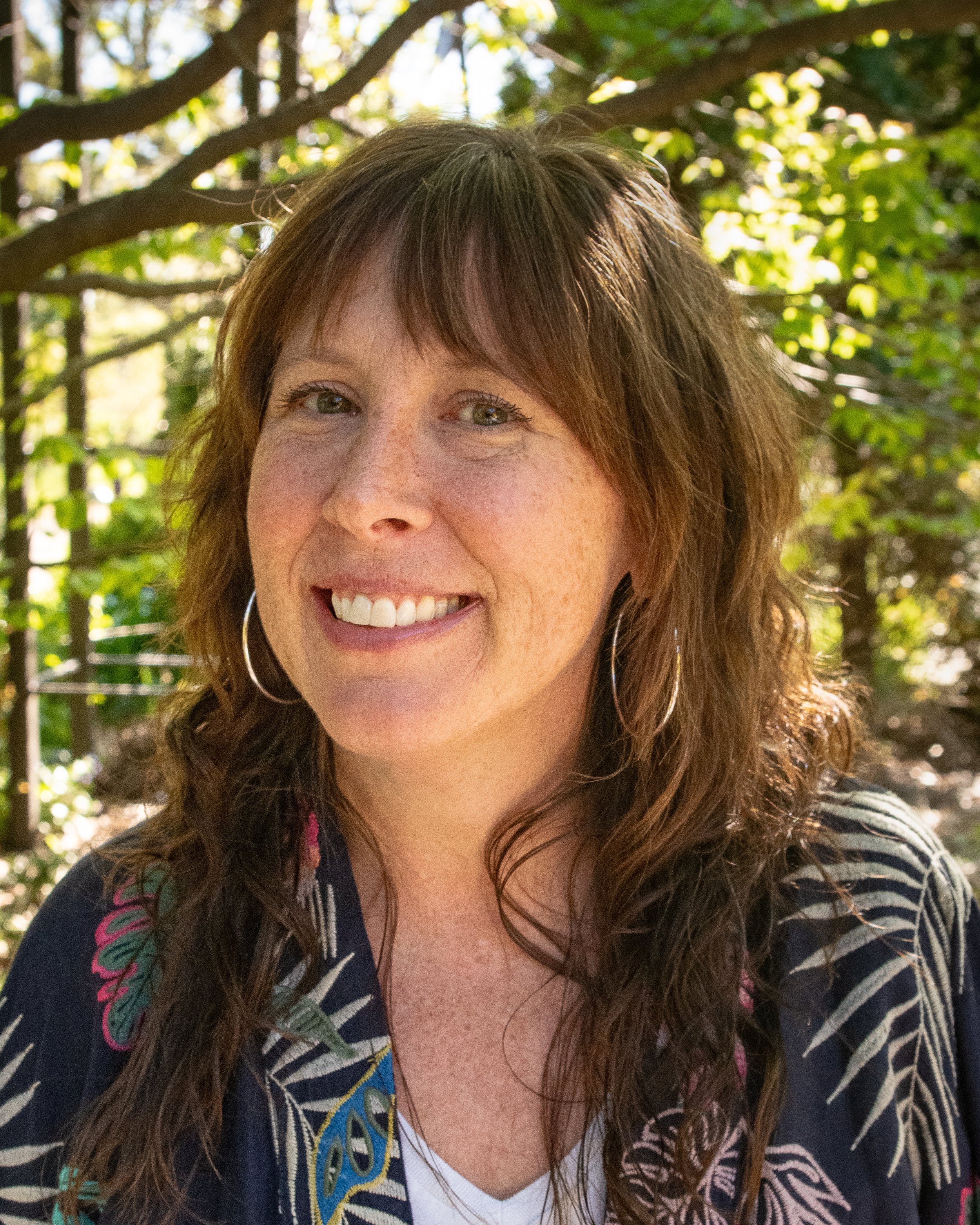 Headshot of co-founder and lead consultant Sarah