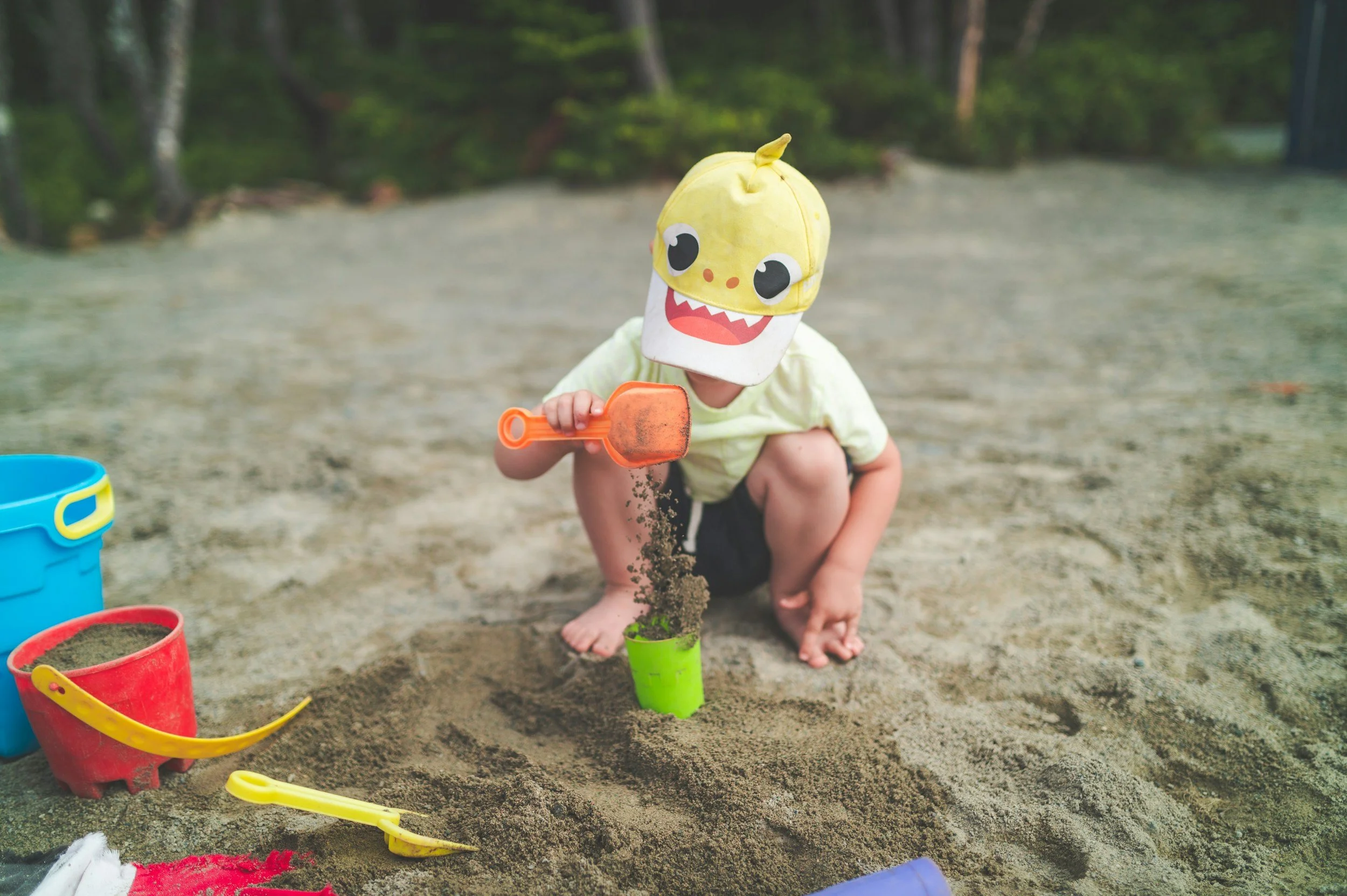 Kid playing in the sand