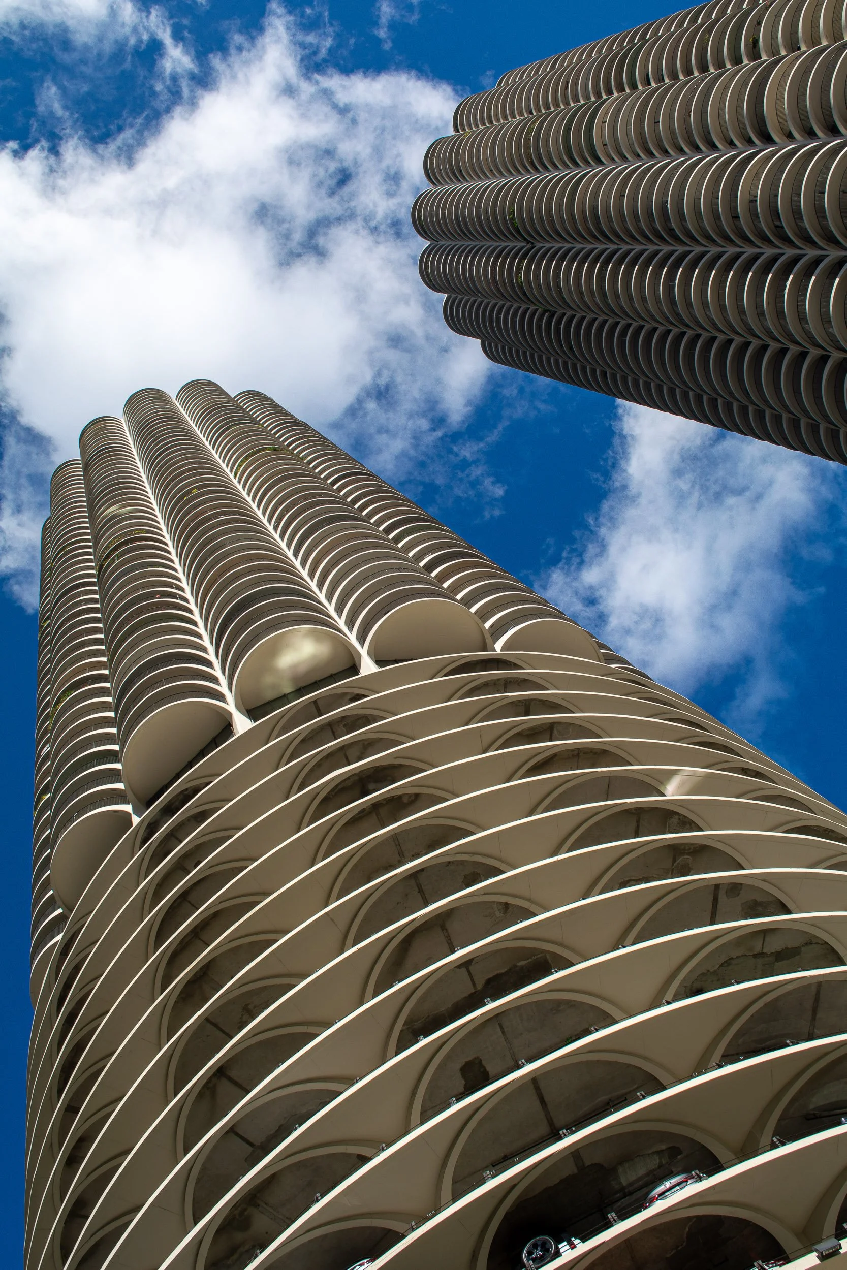 Marina City Shot - A low-angle perspective of the iconic, brutalist concrete balconies of Chicago's Marina City towers reaching into the sky.