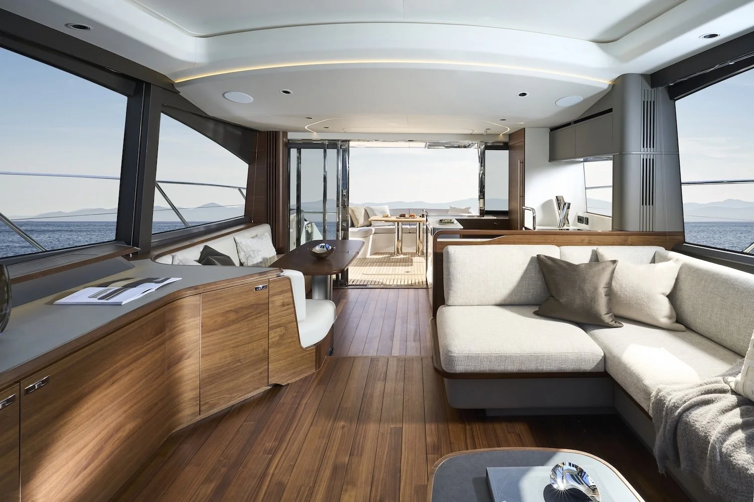 Princess_V65-interior-saloon-looking-aft-american-walnut.jpg