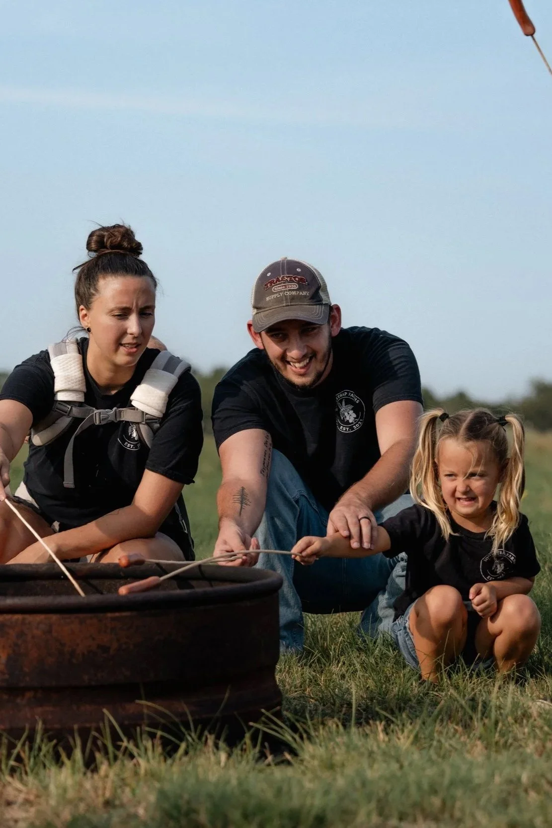 Family roasting marshmallows together