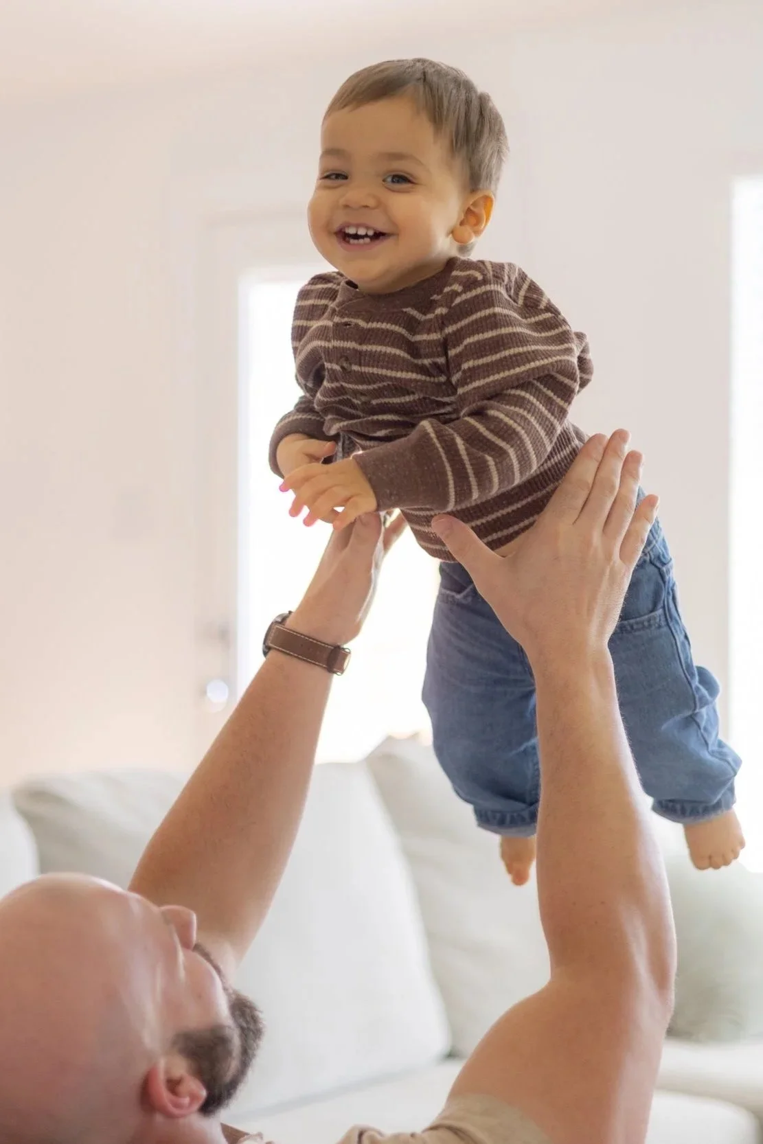 Father playing with his baby son